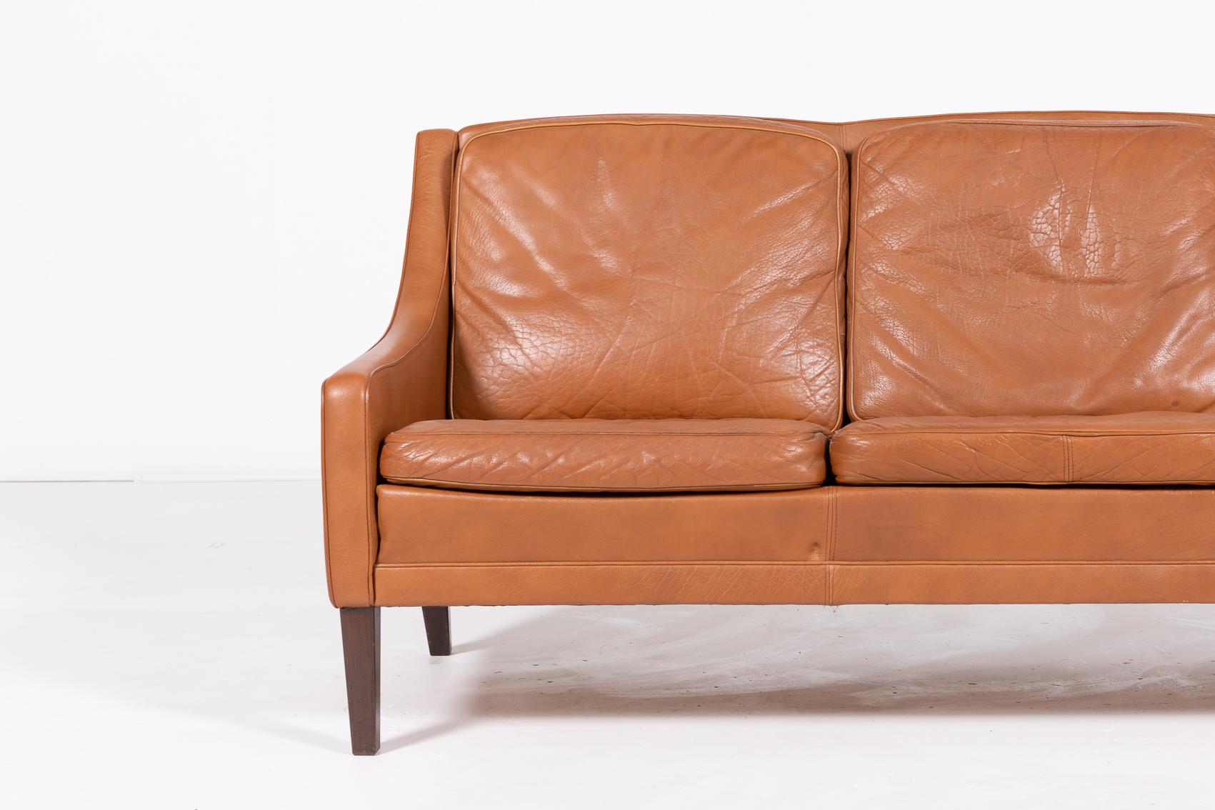 Scandinavian Modern 1970’s Danish Modern cognac leather sofa For Sale