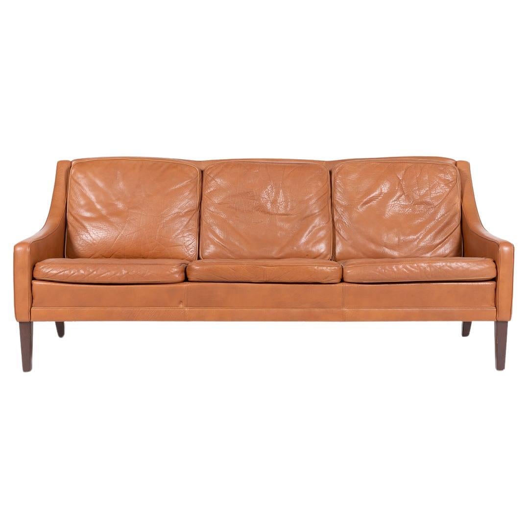 1970’s Danish Modern cognac leather sofa For Sale