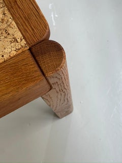 1970s Danish modern dining table produced by FDB in solid oak and natural cork.