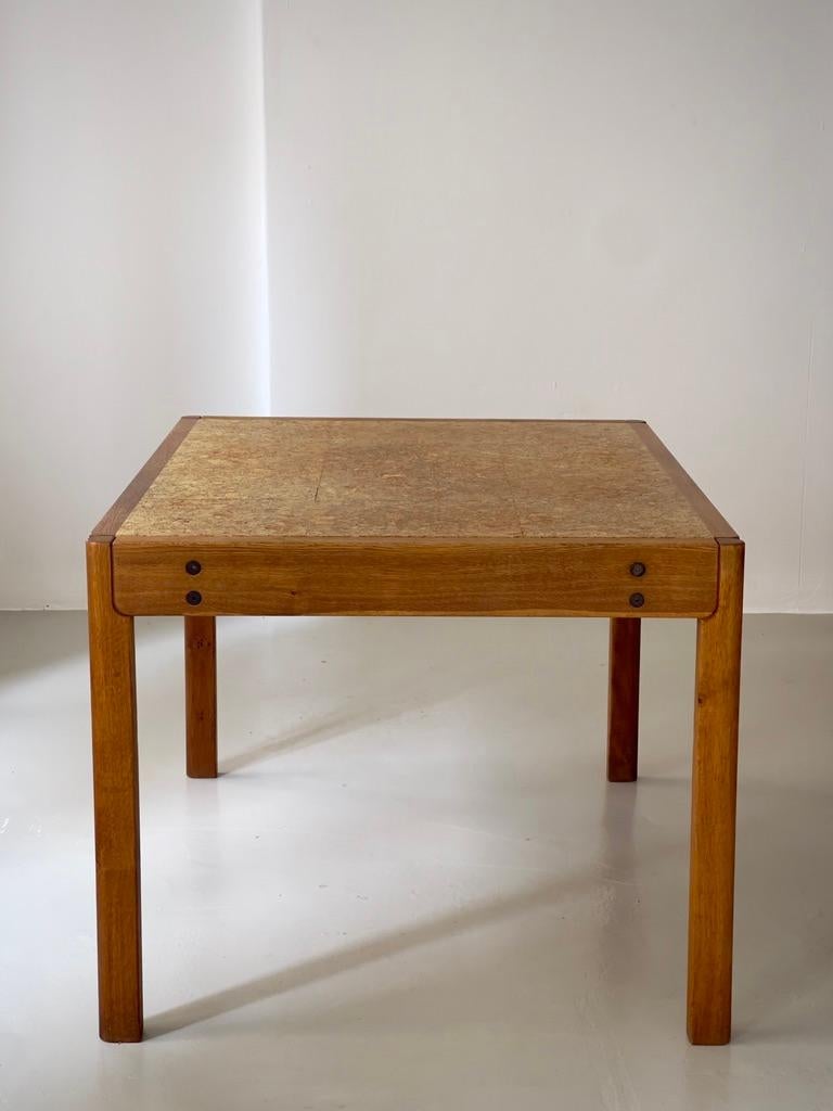 Scandinavian Modern 1970s Danish modern dining table produced by FDB in solid oak and natural kork. For Sale