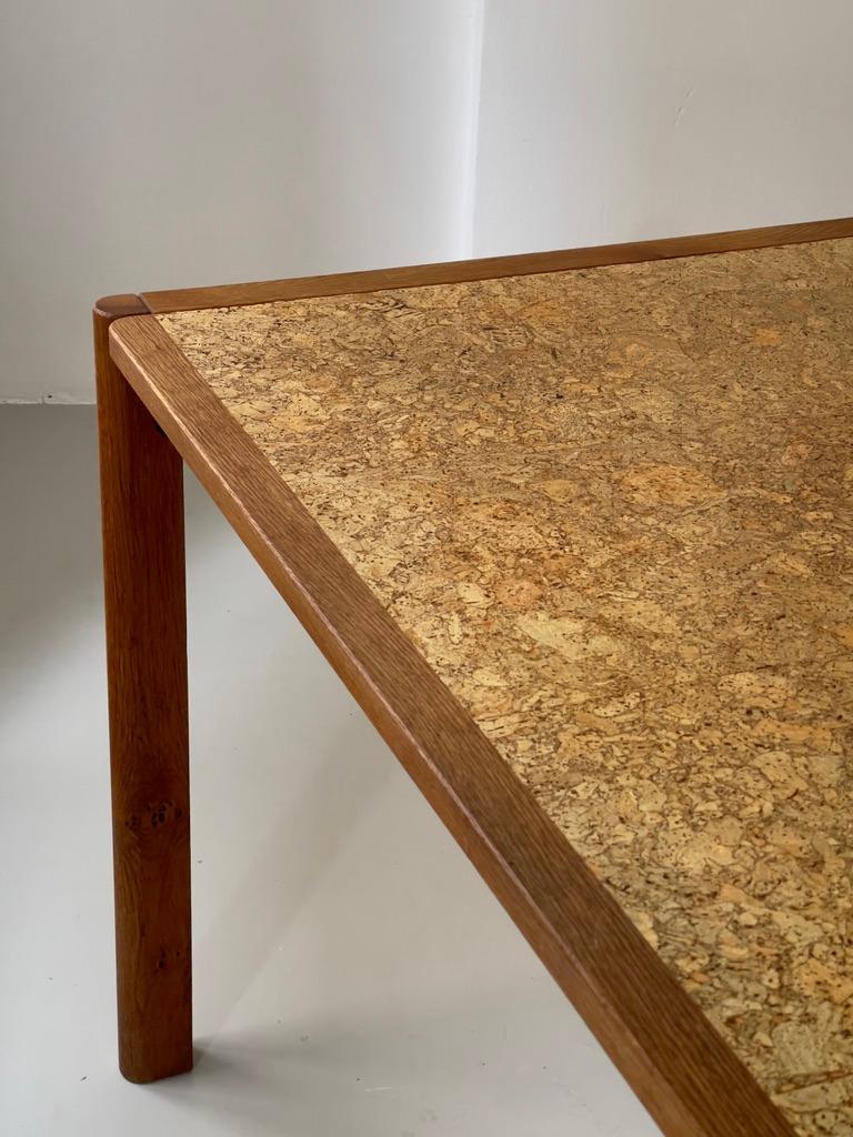 Kork 1970s Danish modern dining table produced by FDB in solid oak and natural kork. For Sale