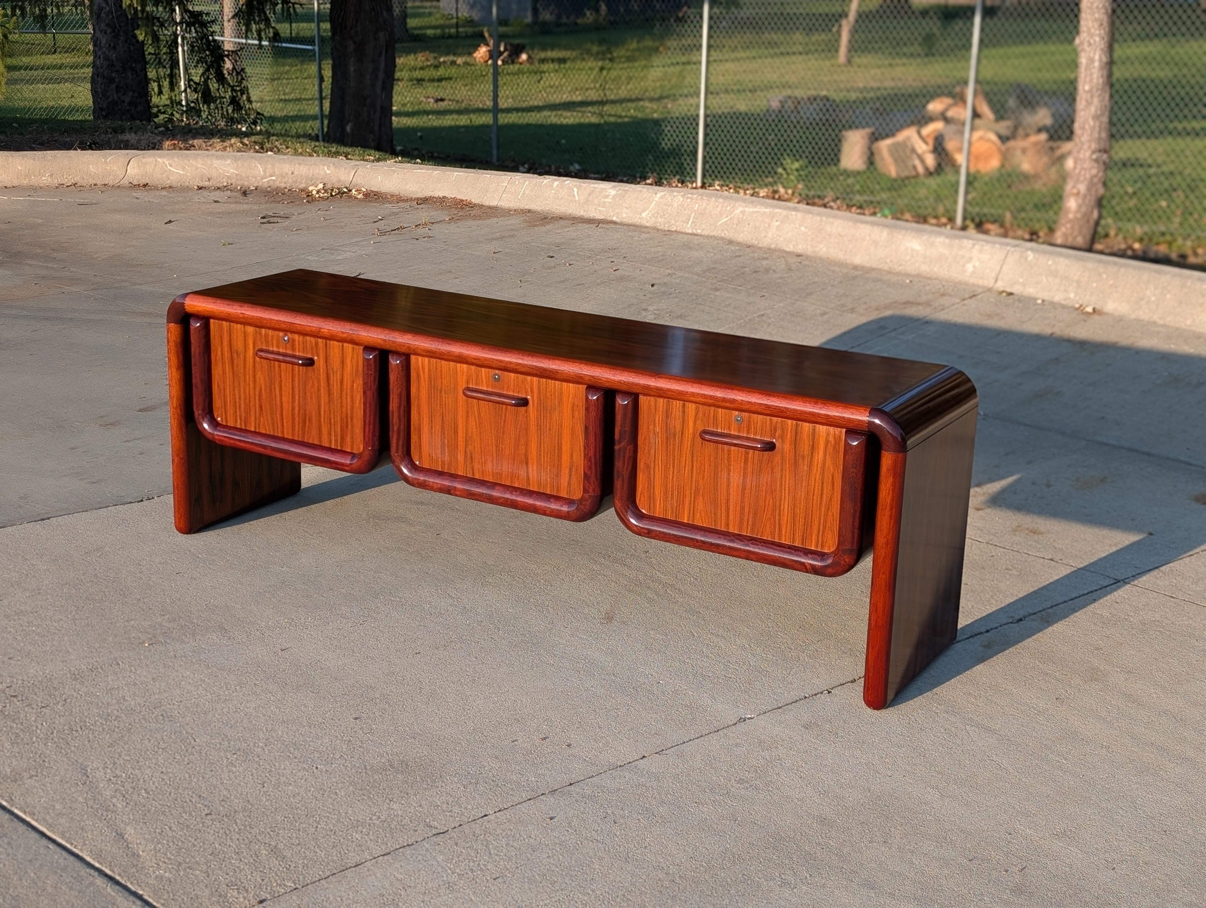 Early production Dyrlund Supreme credenza in rosewood.

From the Supreme model line, designed with 2