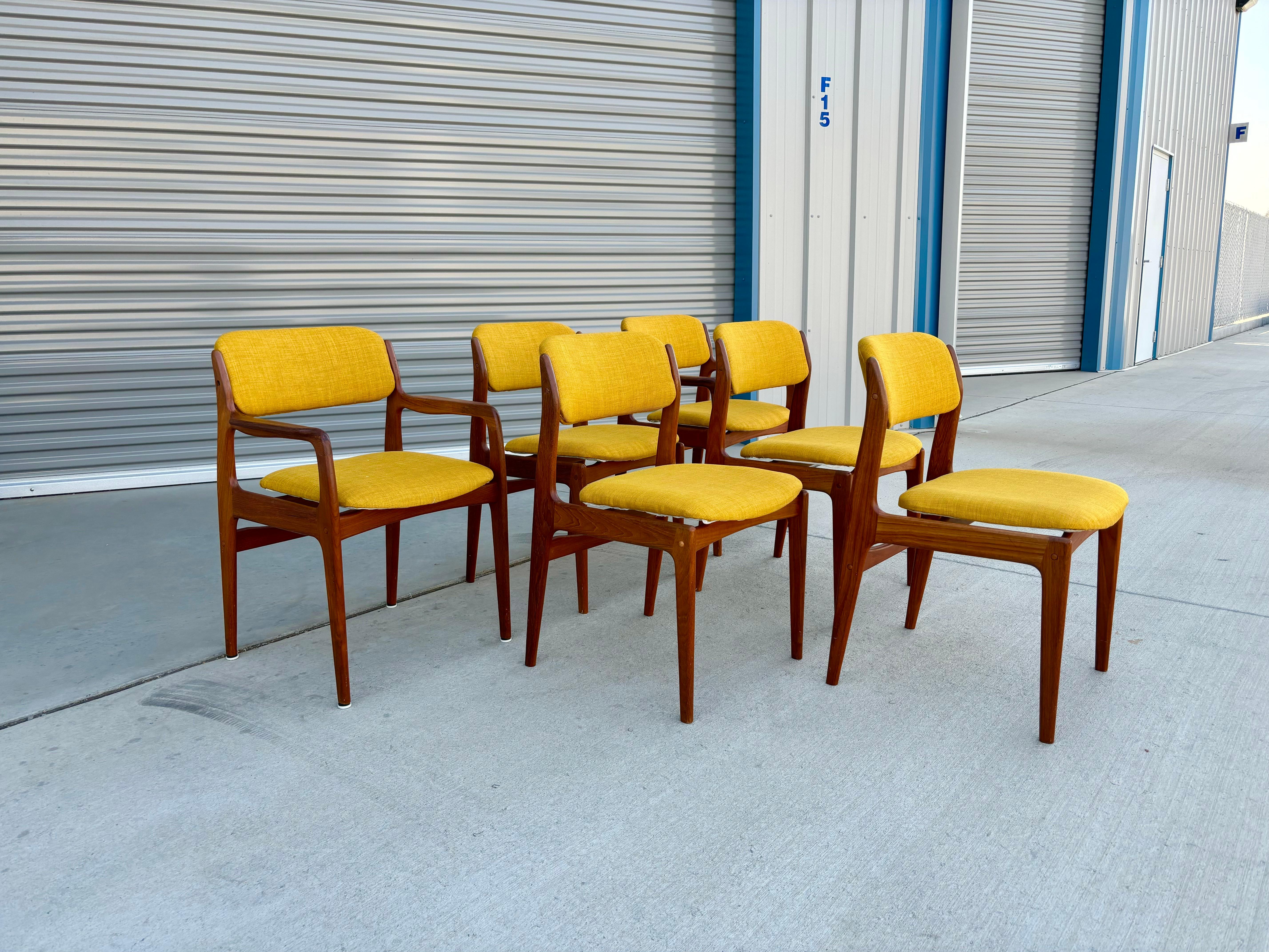 This beautiful mid-century teak dining chair set was designed and manufactured in Denmark circa 1970s. Each chair features a strong, solid teak frame with an excellent color tone and a beautiful grain pattern, creating a refined and elegant look.