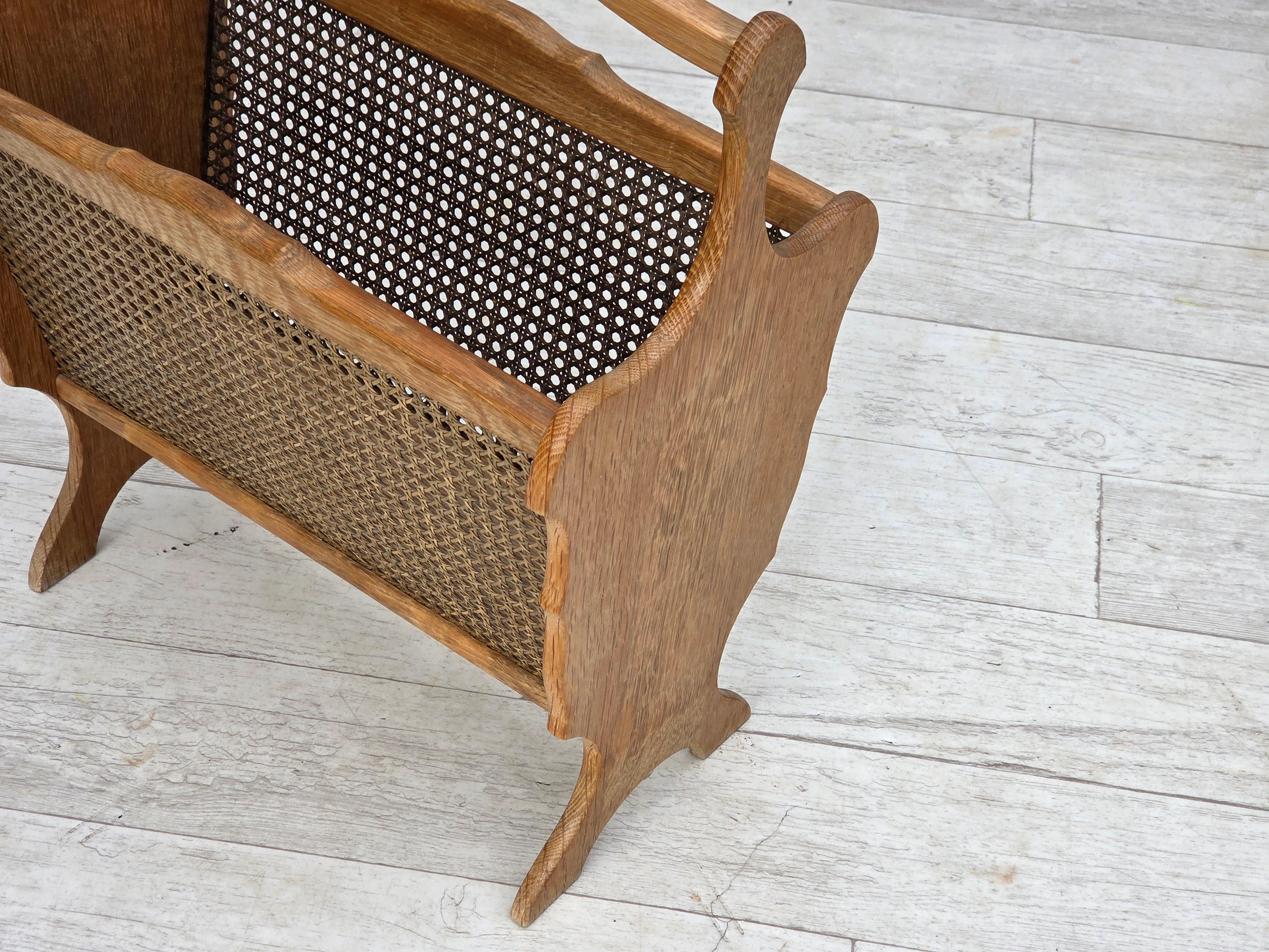 1970s, Danish newspaper holder. Solid oak wood, furniture mesh. Original very good condition: no smells, no stains and stable construction. Manufactured by Danish furniture maker in about 1970-75s. Original Scandinavian vintage design directly from