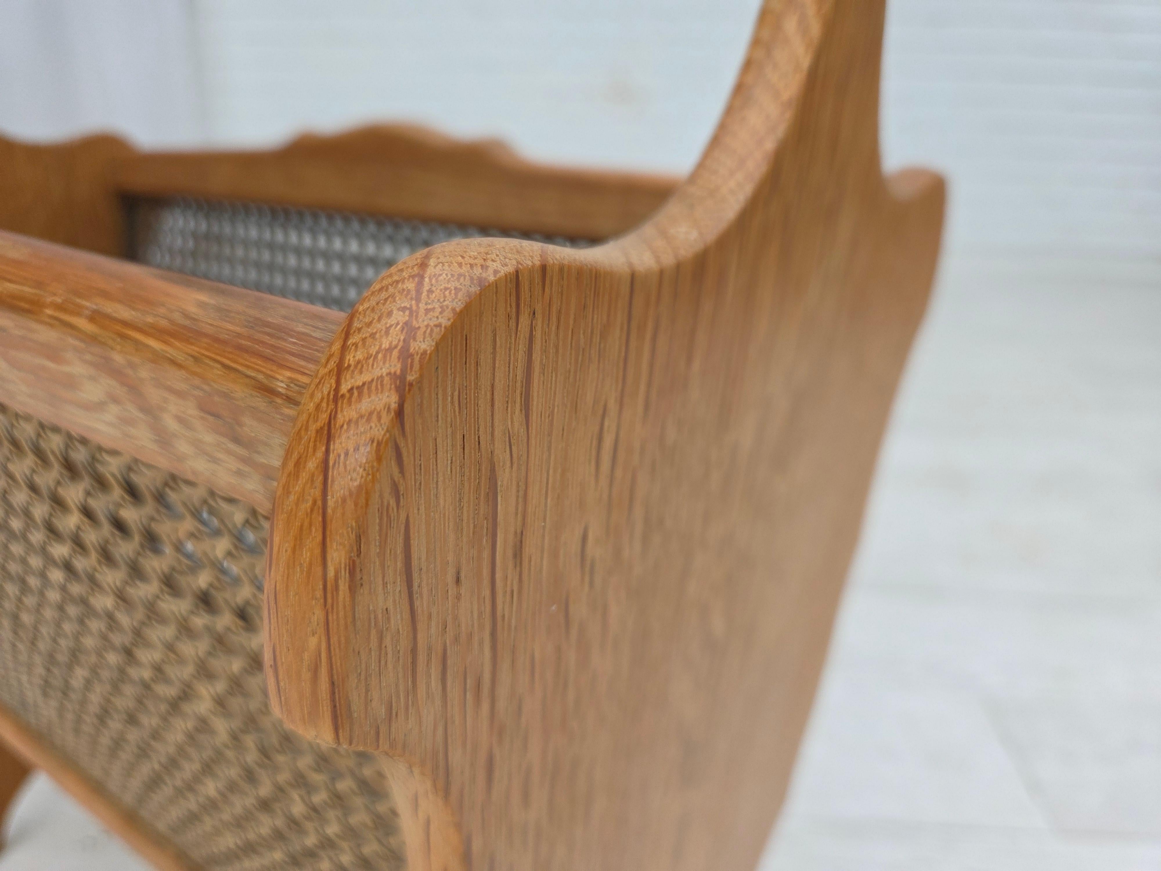 Scandinavian Modern 1970s, Danish newspaper holder, solid oak wood, furniture mesh. For Sale