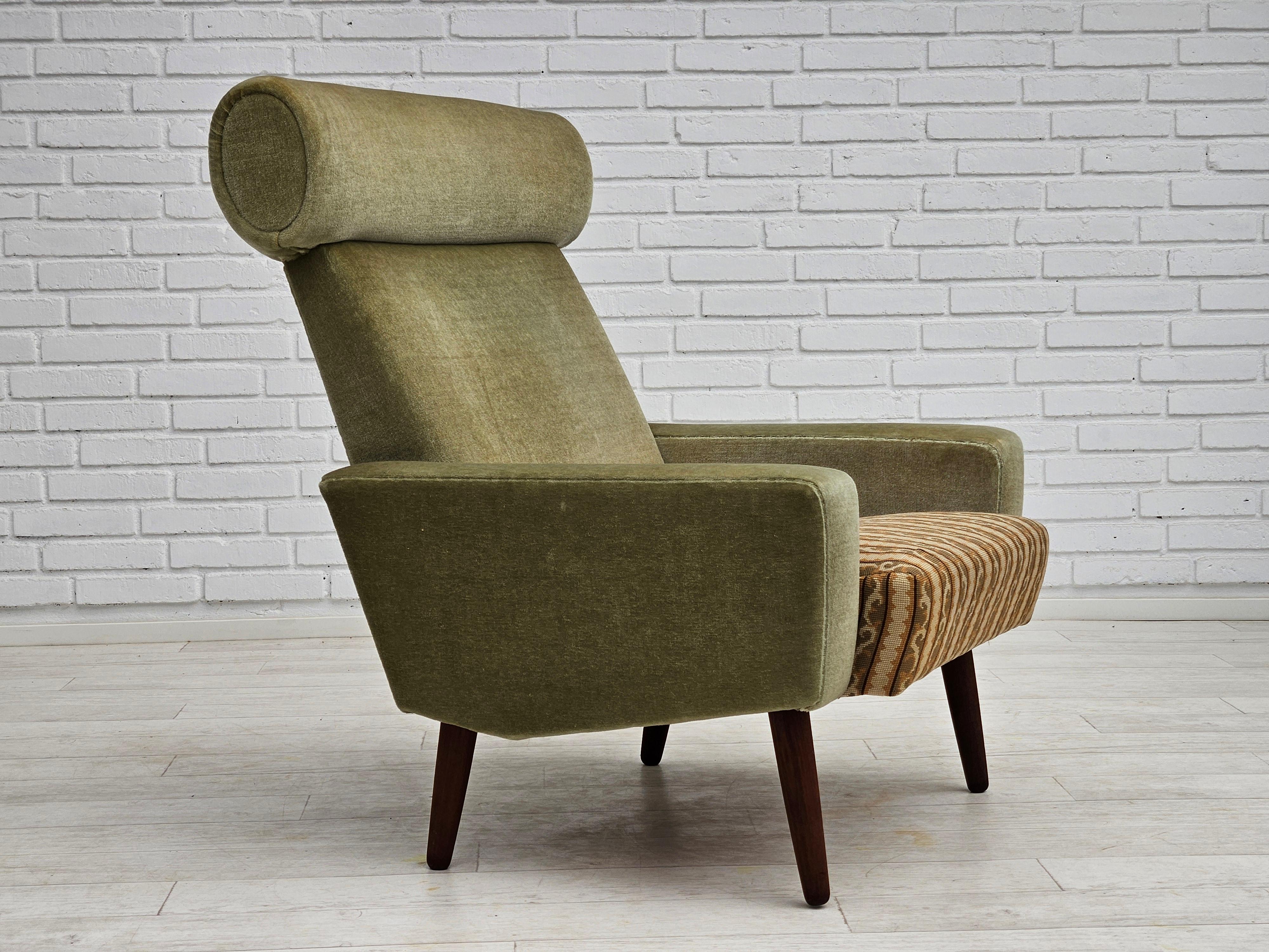 1970s, Danish armchair in original very good condition: no smells and no stains. Original light green furniture velour, woven wool fabric on the seat. Teakwood legs, springs in the seat. Manufactured by Danish furniture manufacturer in about