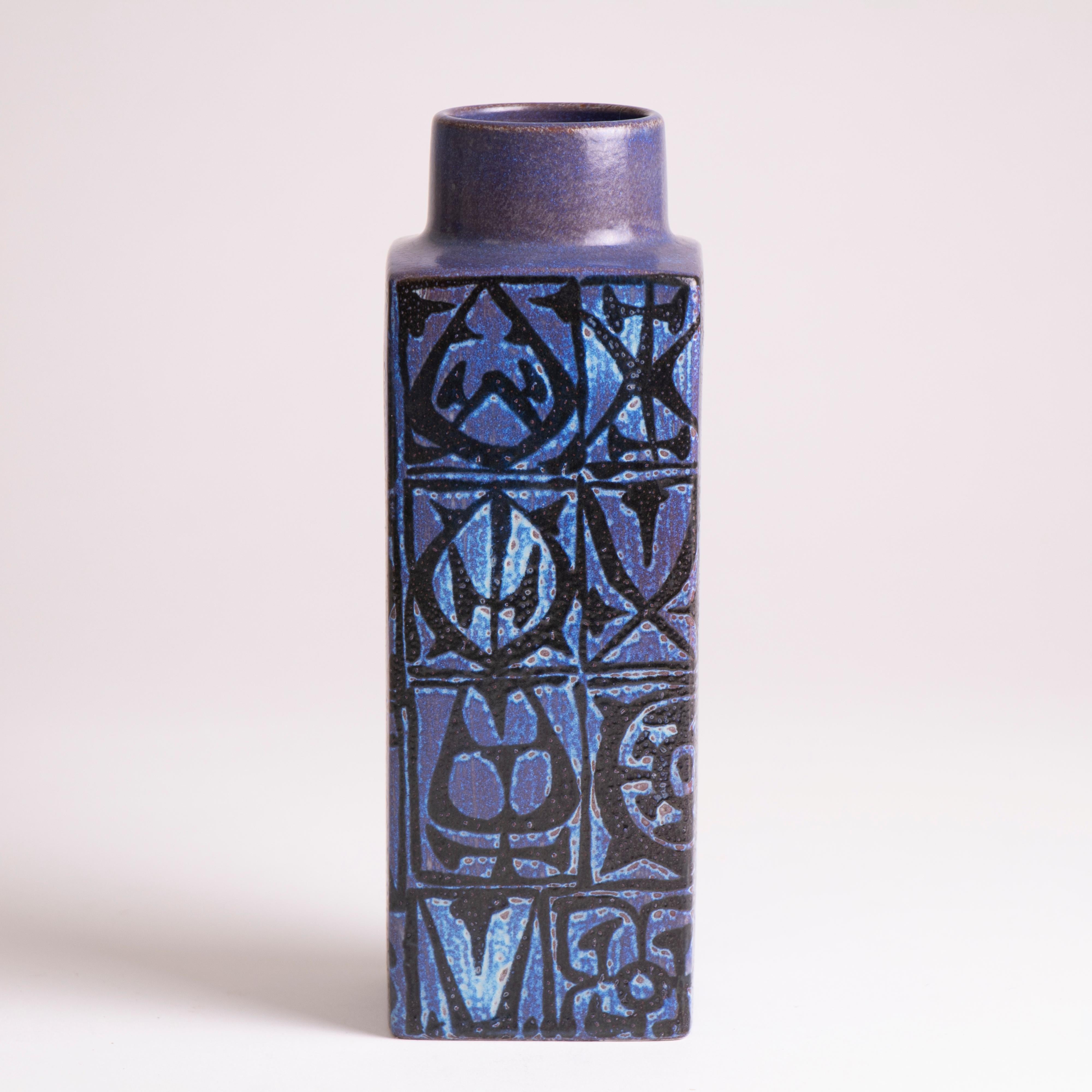 1970s Mid-century Royal Copenhagen vase designed by Nils Thorsson for their BACA series. Thorsson, who was the Artistic Director, designed this series with a highly detailed and complex relief pattern over the body of this vase. The different