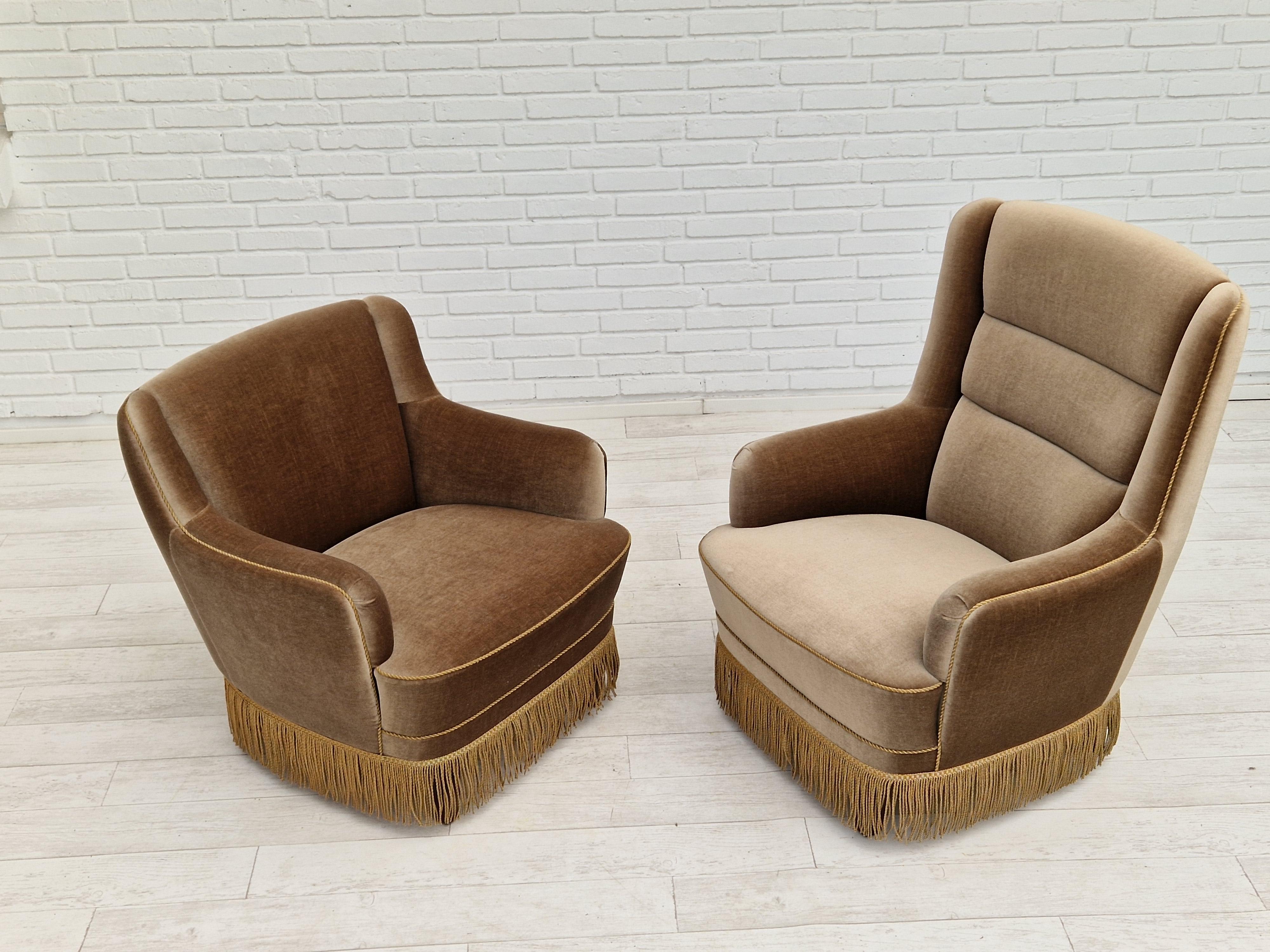 1970s, pair of Danish chairs. Original green velour in very good condition, no smells and no stains. Original springs in the seat. Beech wood legs. ( H 78cm - low chair, H 99cm - high chair ).