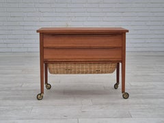 1970s, Danish side chest of drawers, teak wood, rattan, brass wheels, original.