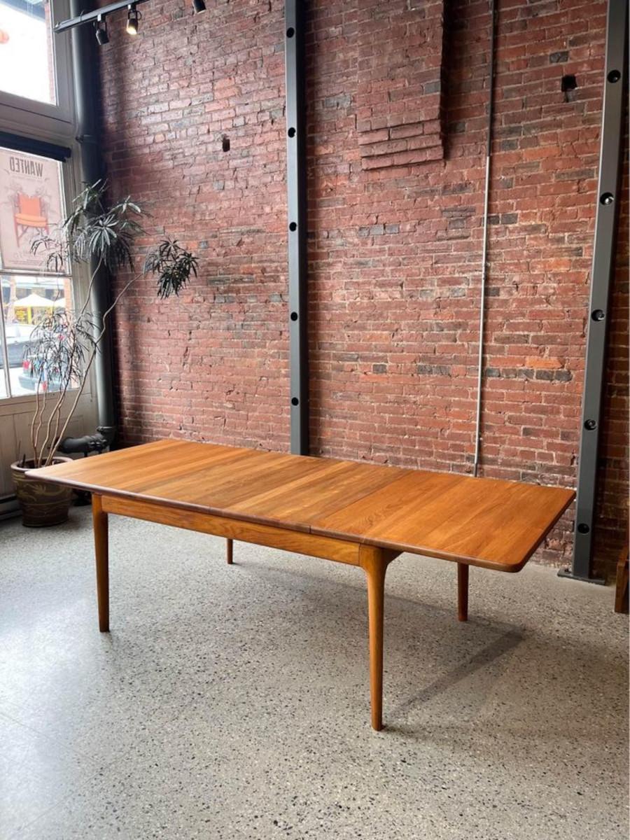 We are pleased to offer this 1970’s Glostrup Møbelfabrik Danish dining table entirely constructed of solid teak, and meticulously crafted with mortise and tenon leg assembly for lasting durability. Designed for both functionality and elegance, this