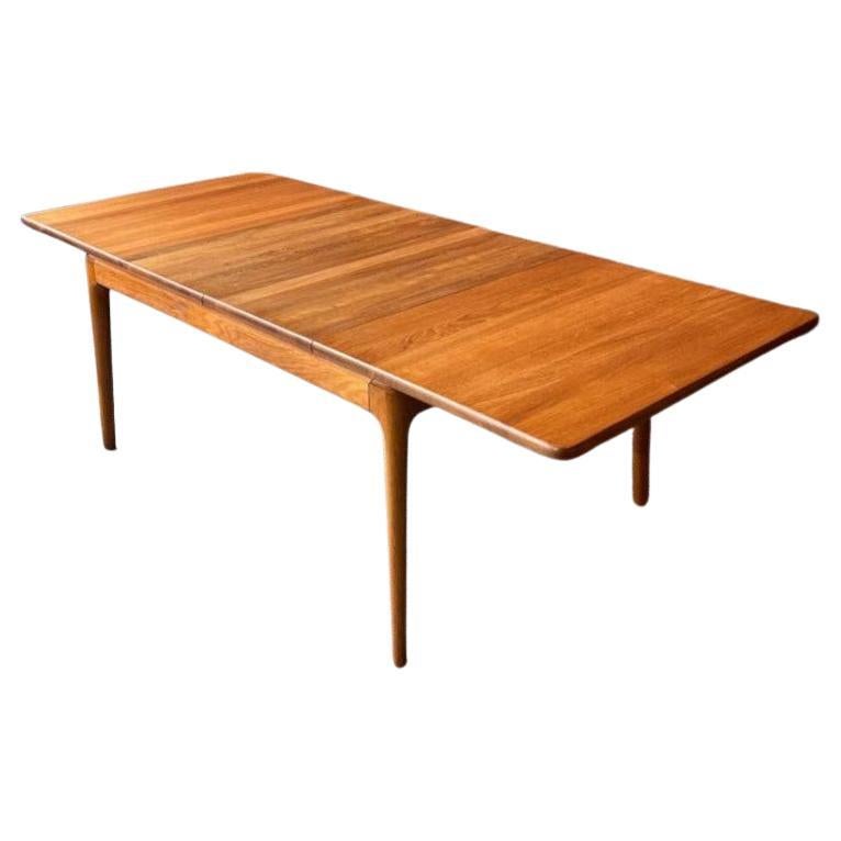 1970’s Danish solid teak dining table by Glostrup Møbelfabrik For Sale
