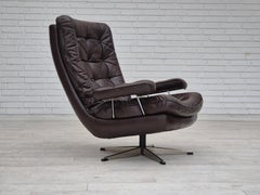 1970er Jahre, dänischer Drehsessel, Originalzustand, braunes Möbelleder.