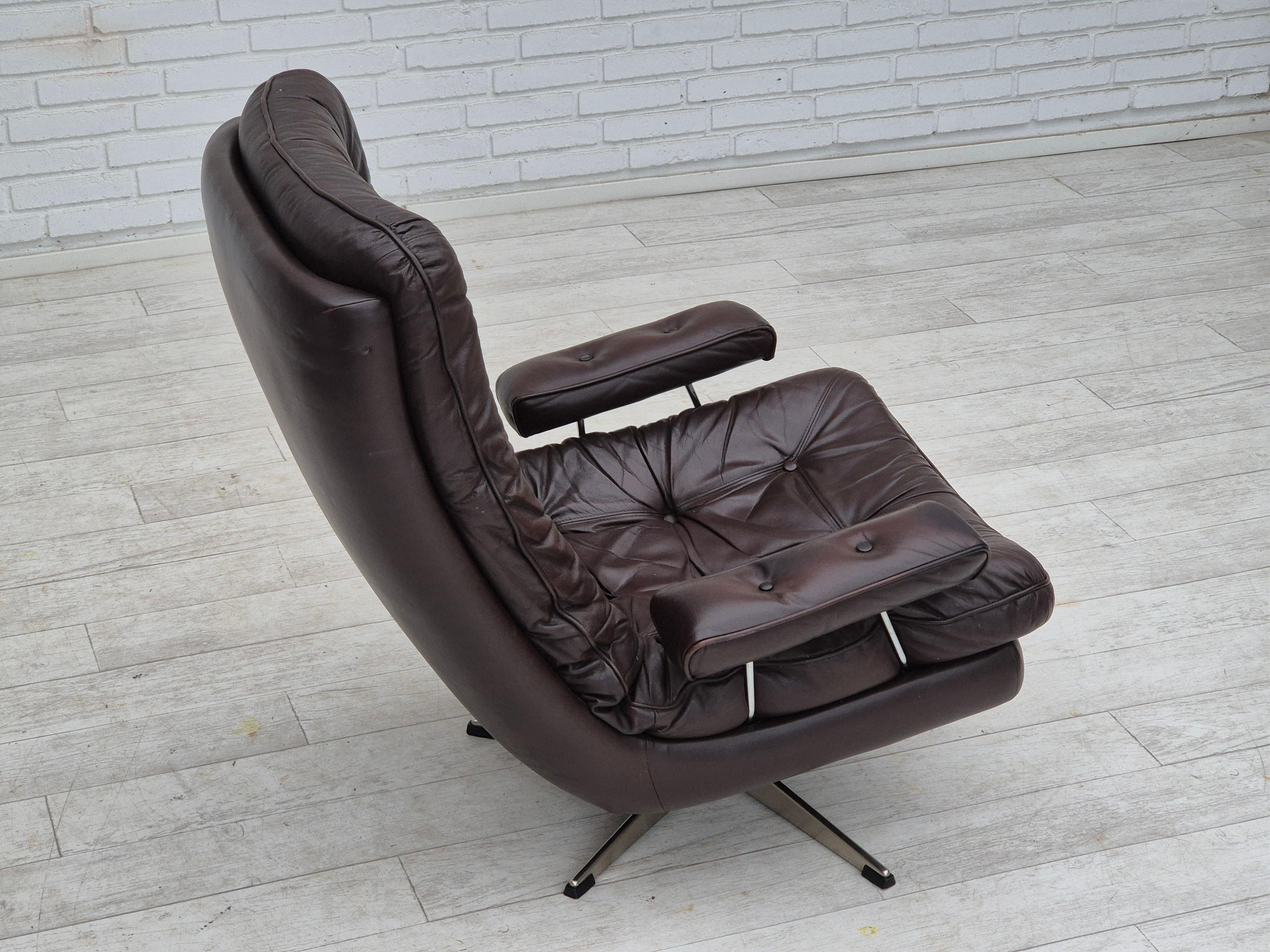 Late 20th Century 1970s, Danish swivel chair, original condition, brown furniture leather. For Sale