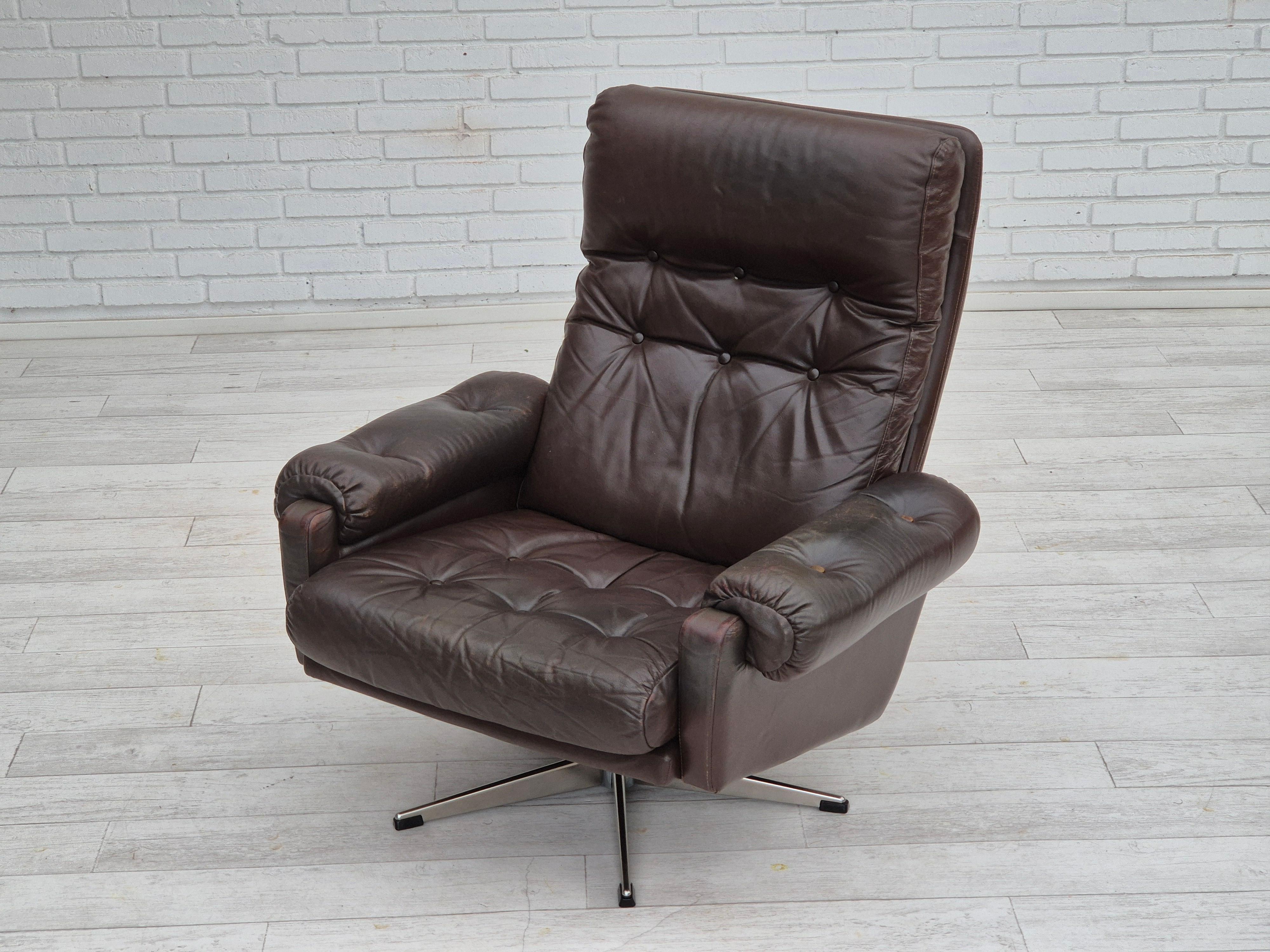 Late 20th Century 1970s, Danish swivel chair, original condition, brown furniture leather. For Sale