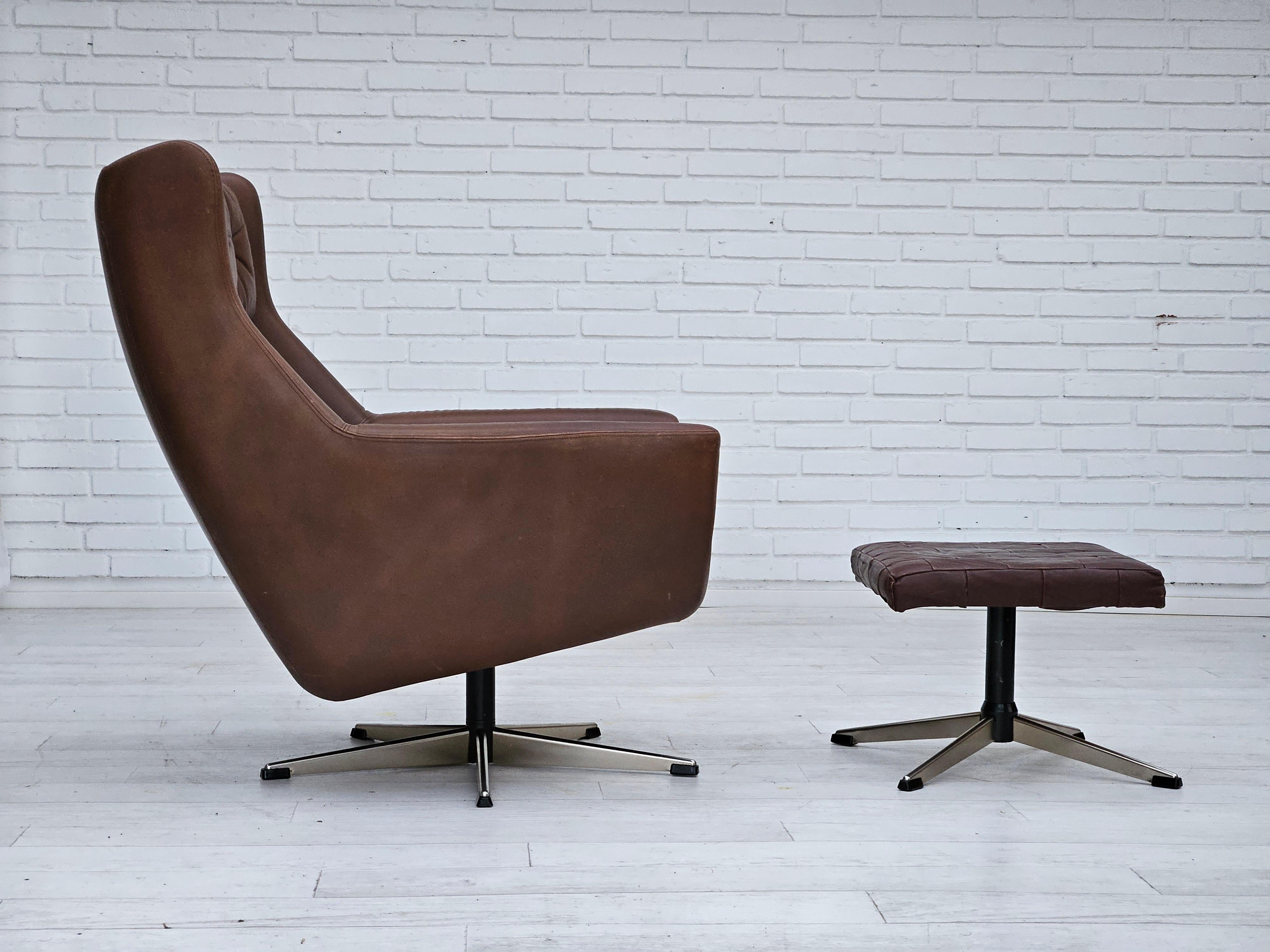Scandinavian Modern 1970s, Danish swivel chair with footstool, original good condition, leather. For Sale