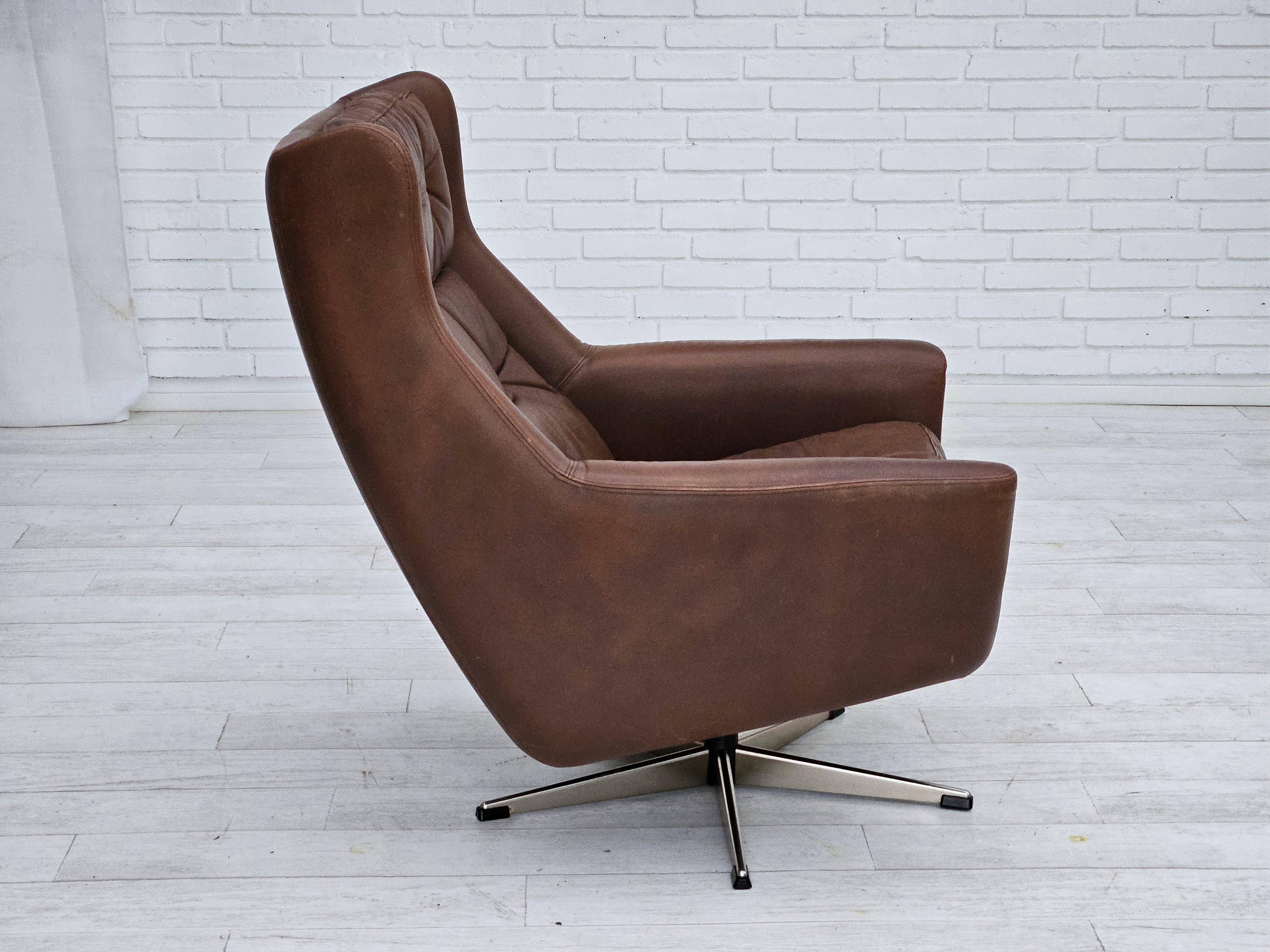 Steel 1970s, Danish swivel chair with footstool, original good condition, leather. For Sale