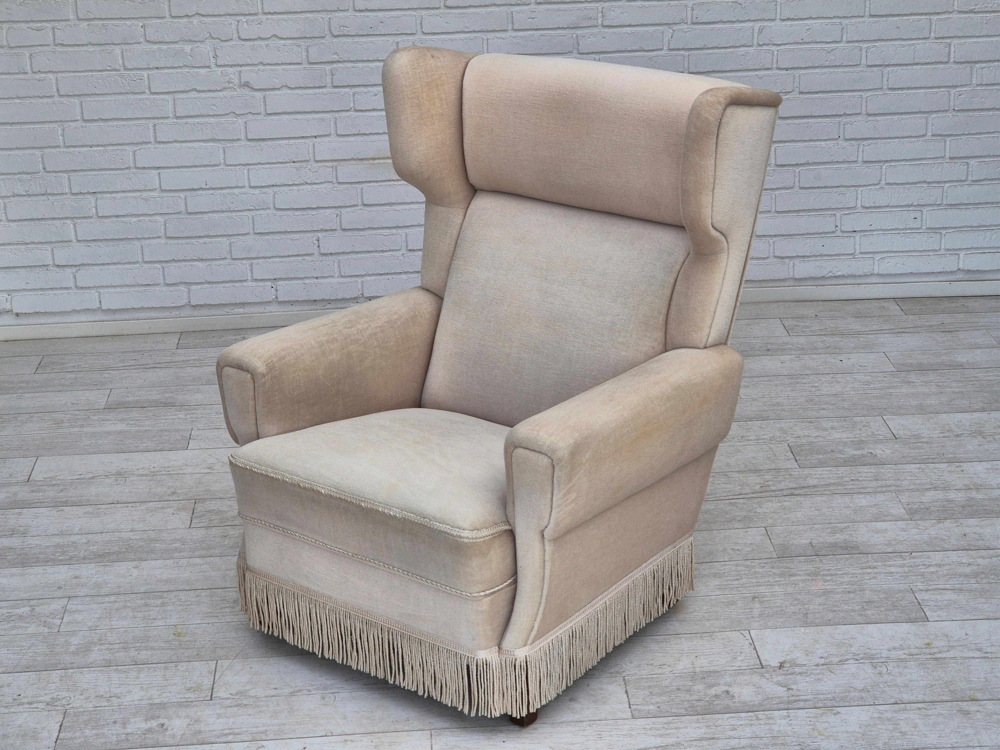 1970s, Danish wingback armchair, original condition, furniture velour, ash wood. For Sale 14