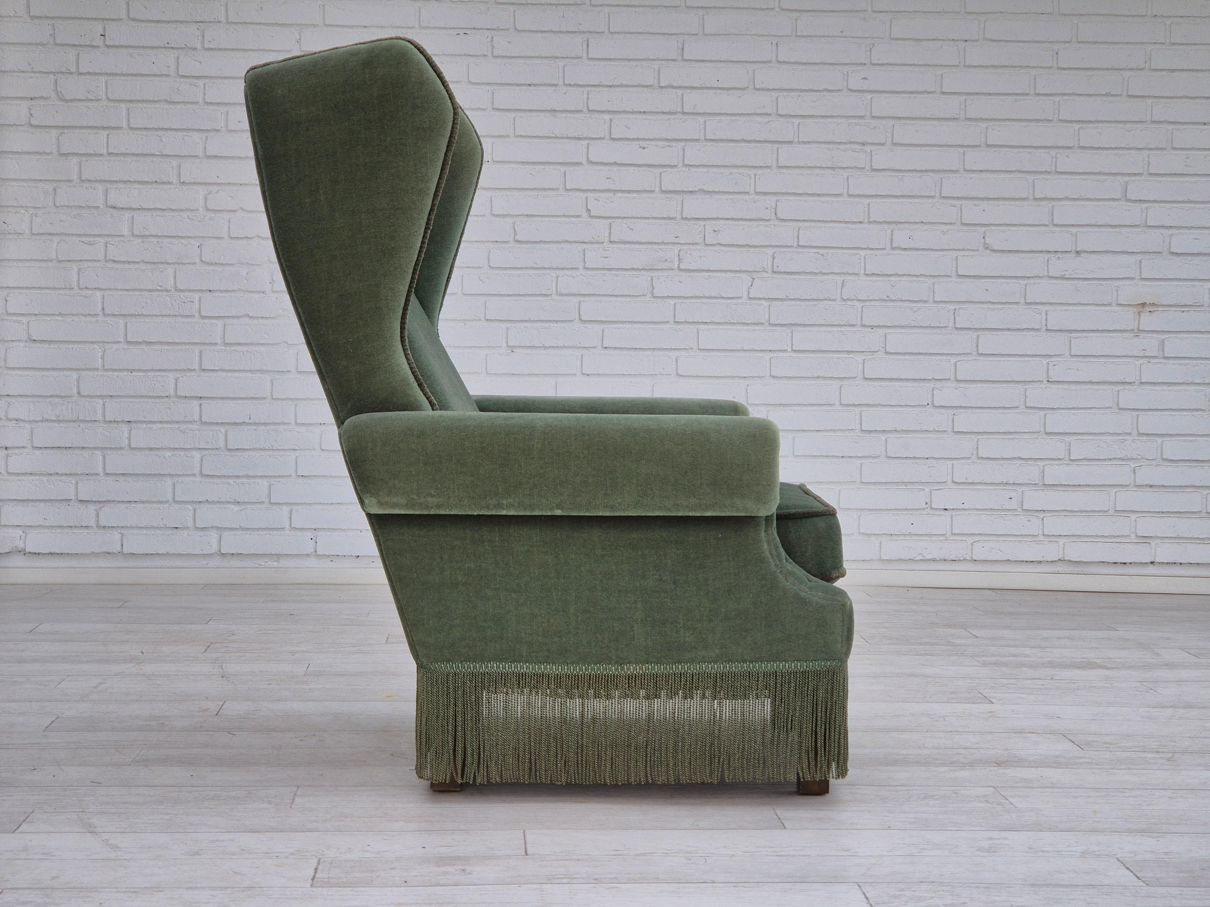 Scandinavian Modern 1970s, Danish wingback armchair, original condition, furniture velour, beech. For Sale