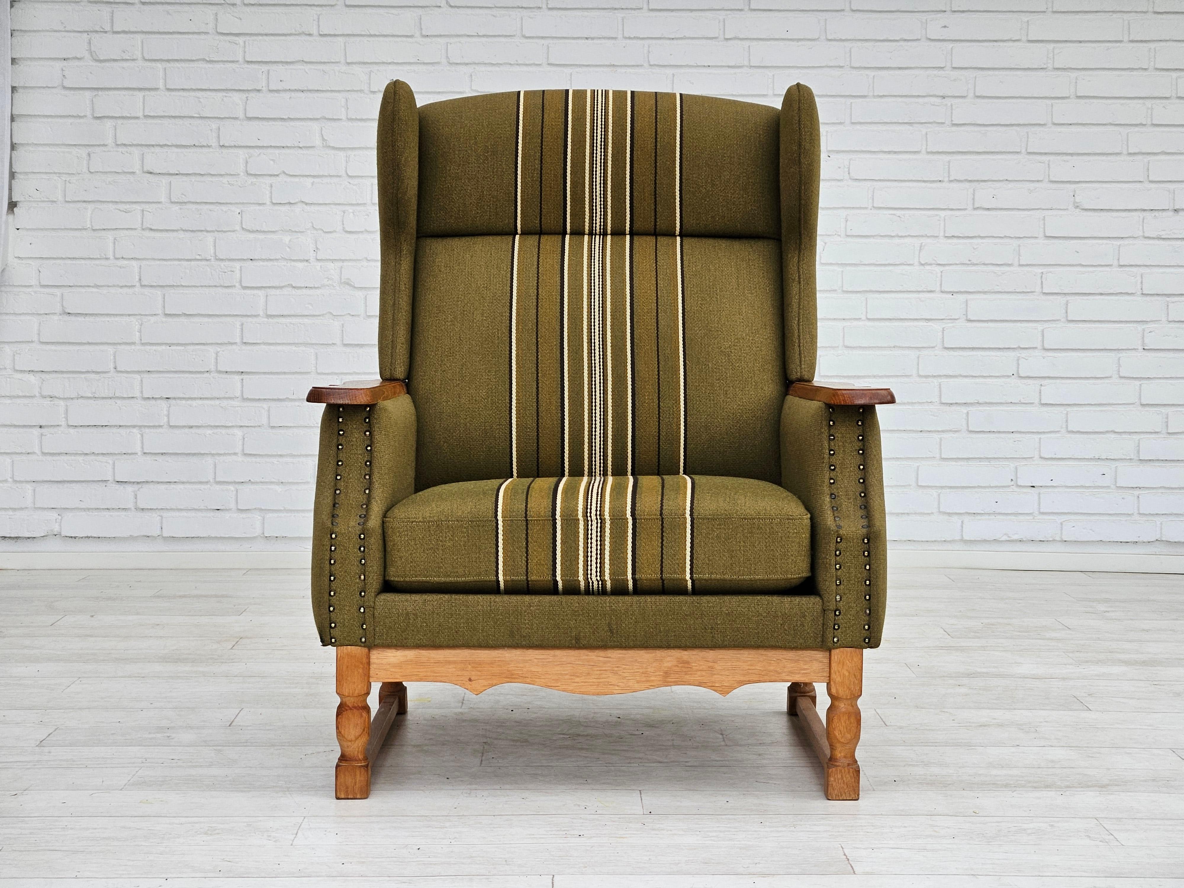 Scandinavian Modern 1970s, Danish wingback chair, original upholstery, green furniture wool. For Sale