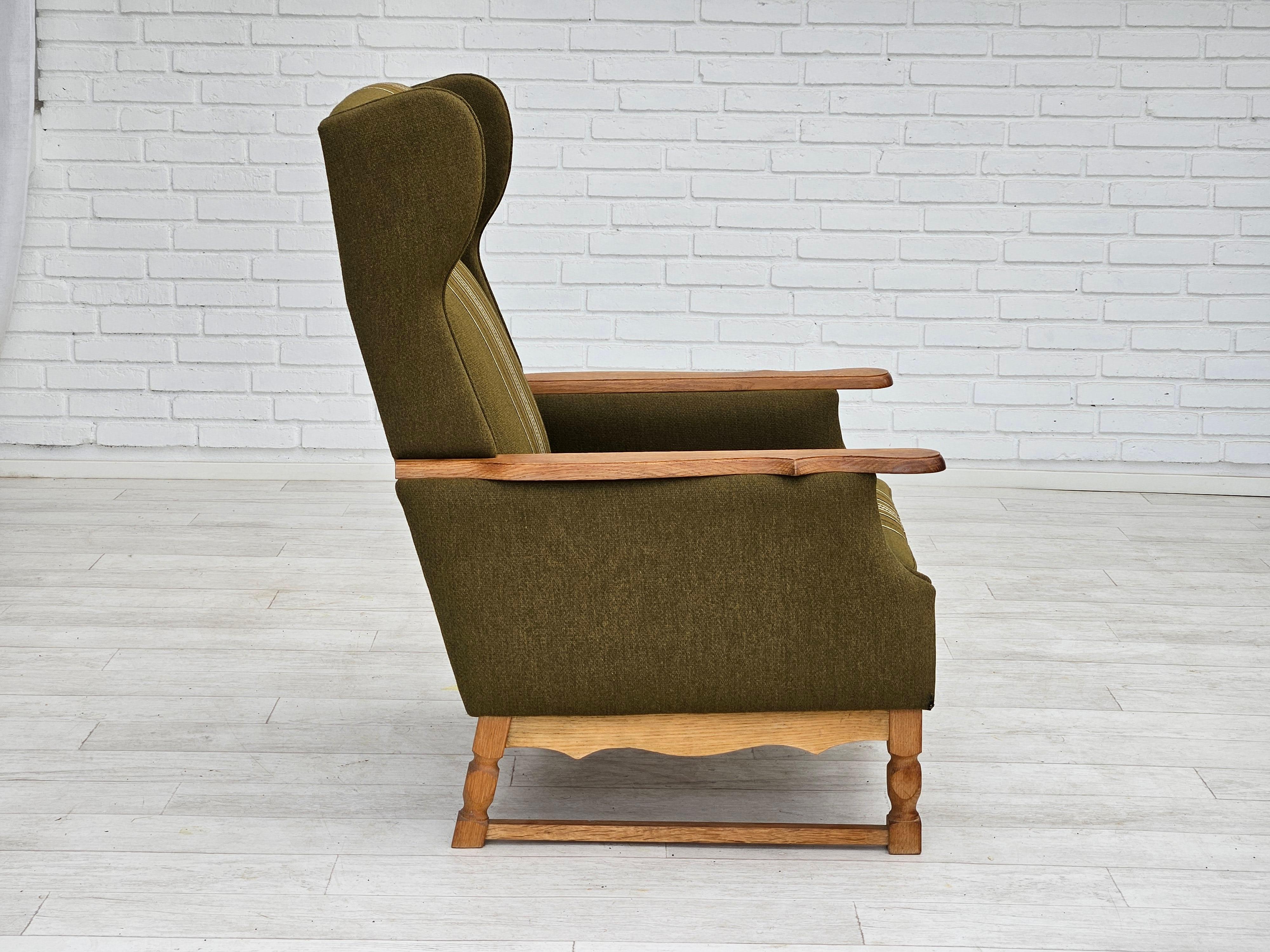 1970s, Danish wingback chair, original upholstery, green furniture wool. In Good Condition For Sale In Tarm, 82