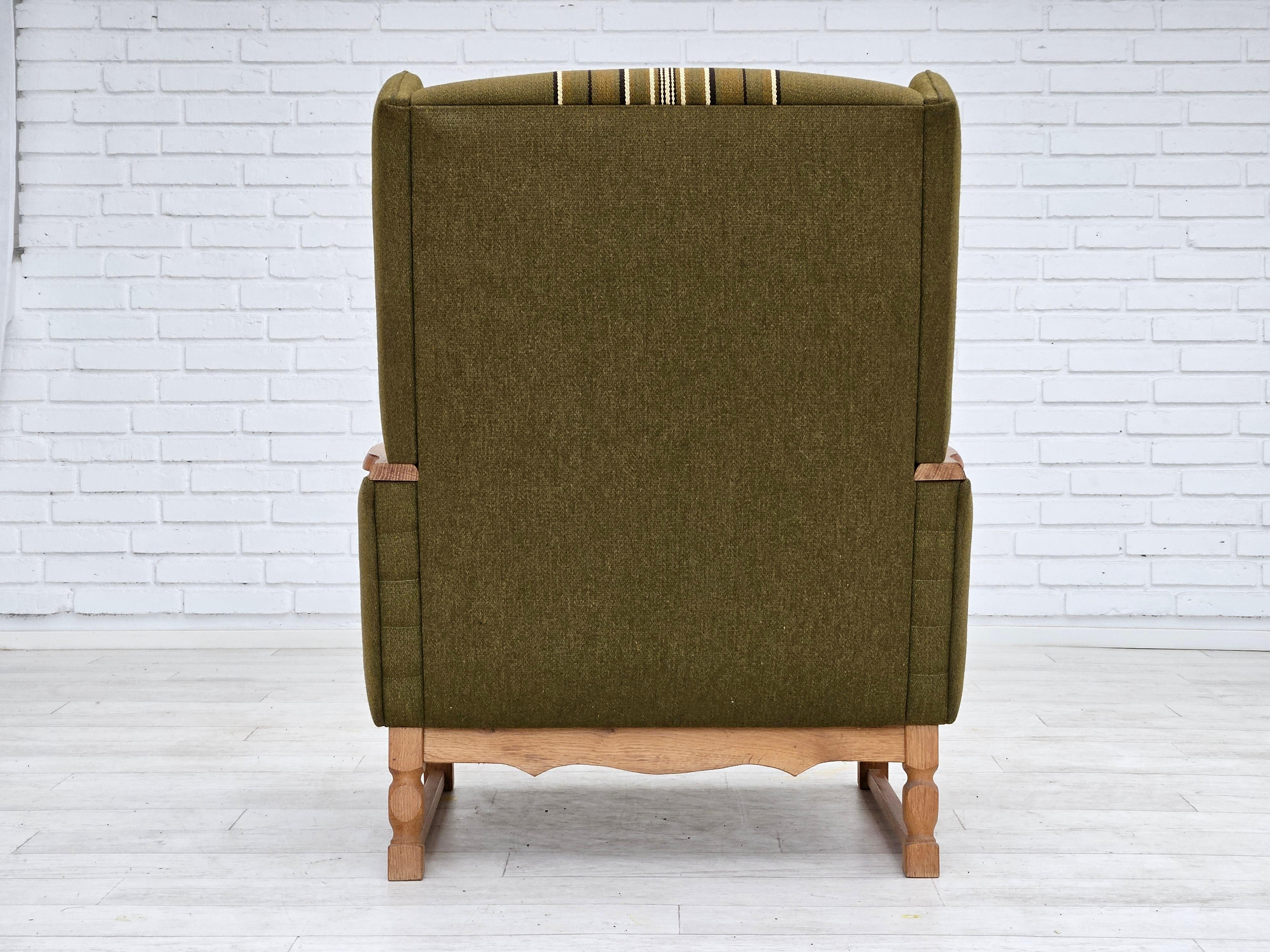 Late 20th Century 1970s, Danish wingback chair, original upholstery, green furniture wool. For Sale