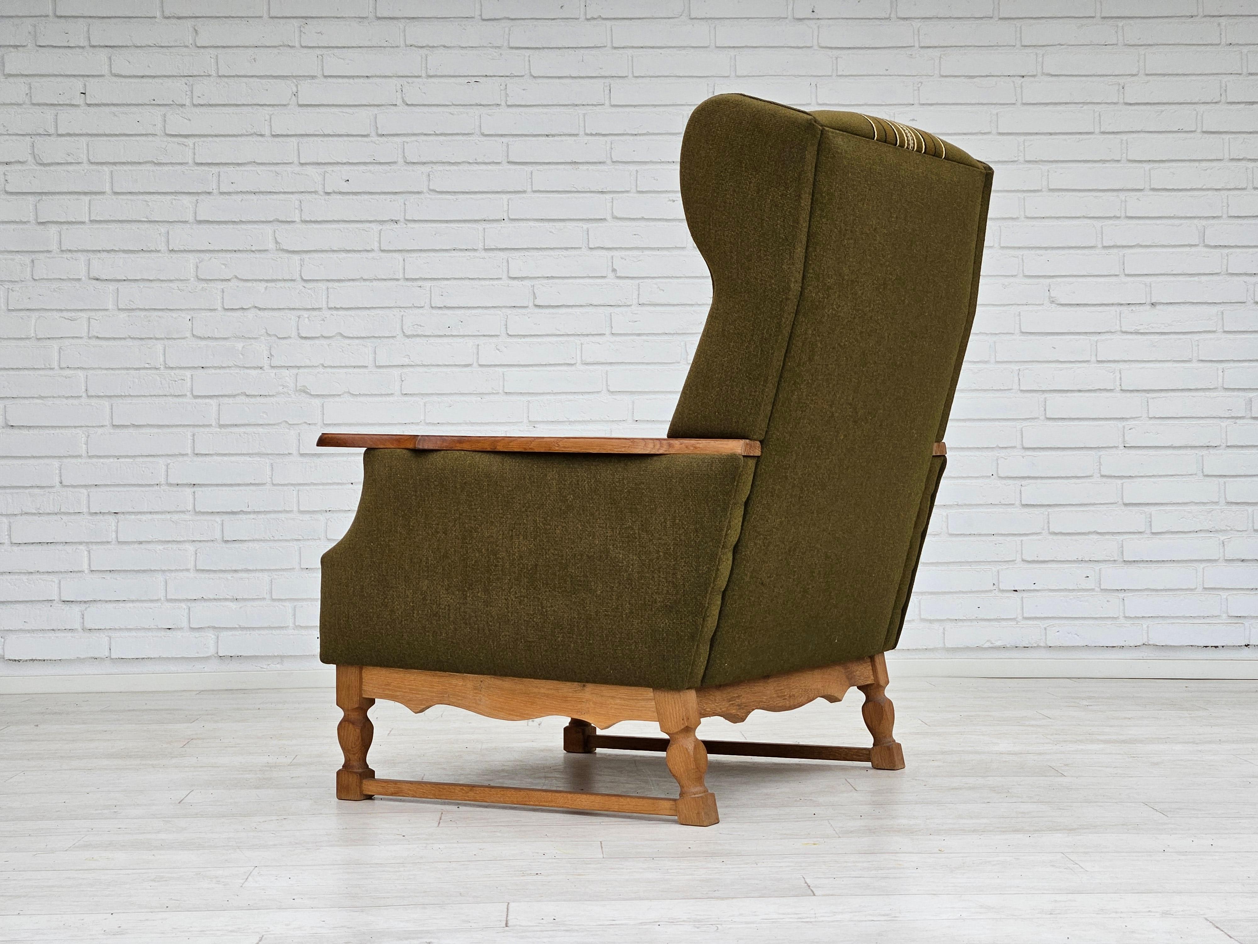 Wool 1970s, Danish wingback chair, original upholstery, green furniture wool. For Sale