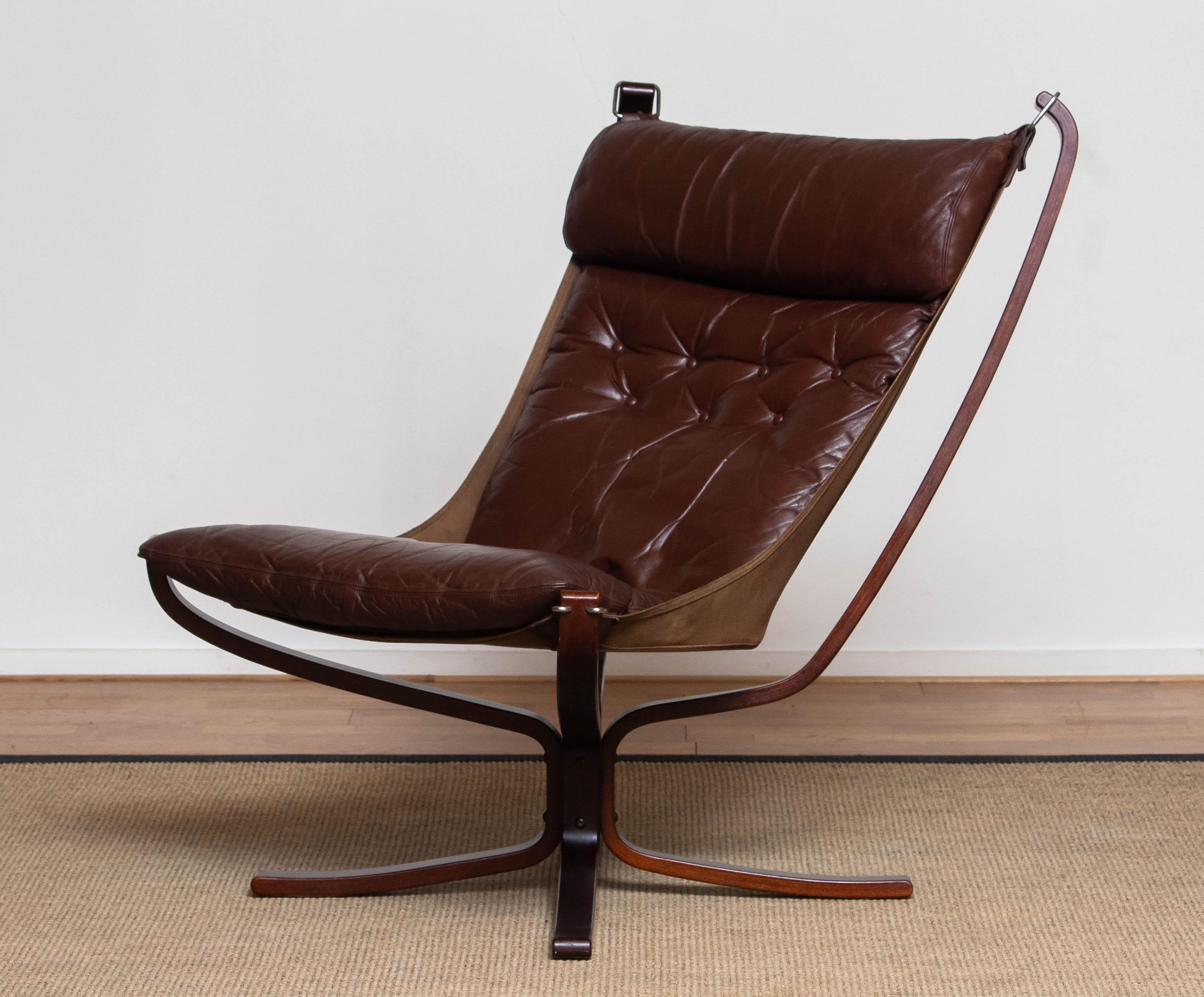 1970's Dark Brown Leather 'Falcon' Highback Chair and Ottoman by Sigurd Ressell  In Good Condition In Silvolde, Gelderland