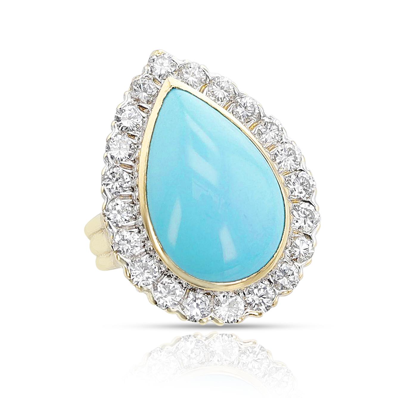 A 1970s David Webb Turquoise Cabochon and Diamond Ring made in 18k and Platinum top. The pear shape turquoise cabochon is 13 x 20 mm. The diamonds weigh appx. 2.10 carats total, G/H color, VS clarity. Maker's mark. Ring Size 6 US. The length of the