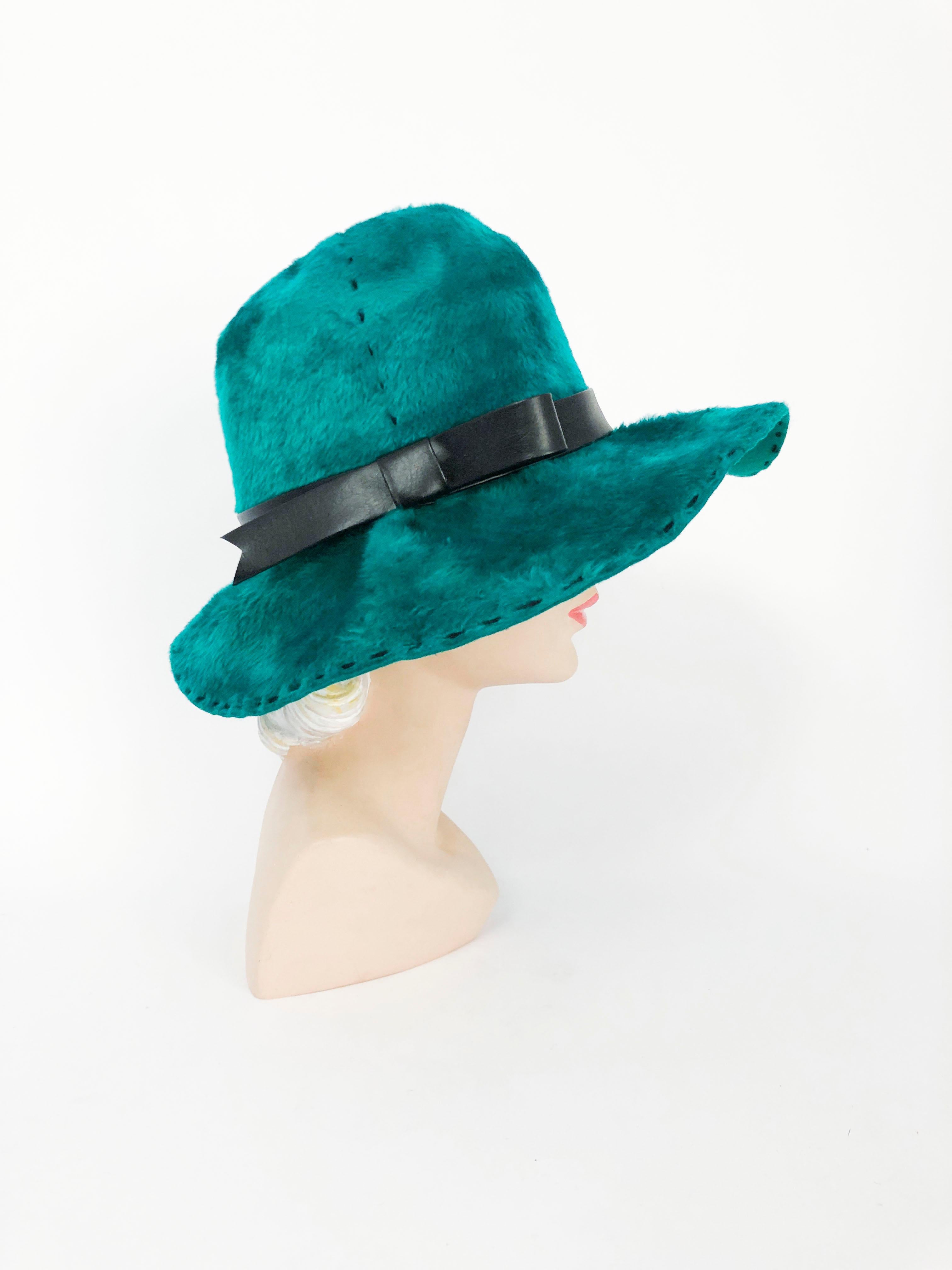 teal green hat