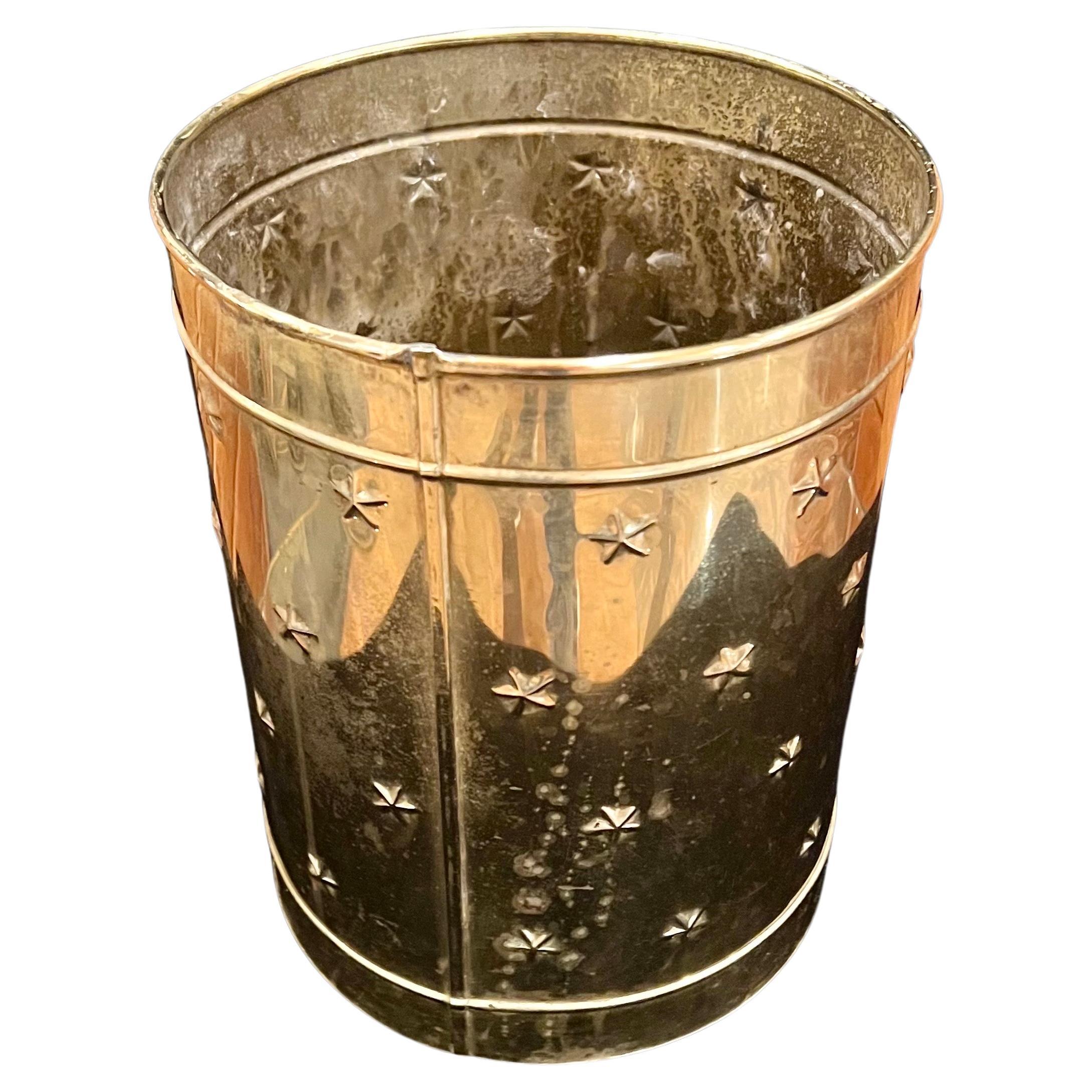 Beautiful elegant polished patinated brass cylinder waste basket or planter with stars pattern we have cleaned and polished the piece its very unique and rare.
