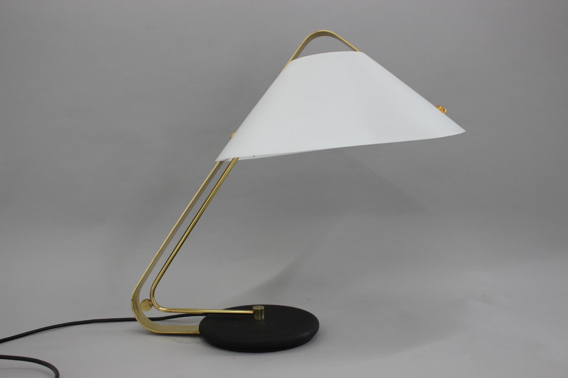 - made of iron and brass 
- Lamp shade made of plastic ¨
- E26 or E27bulb.