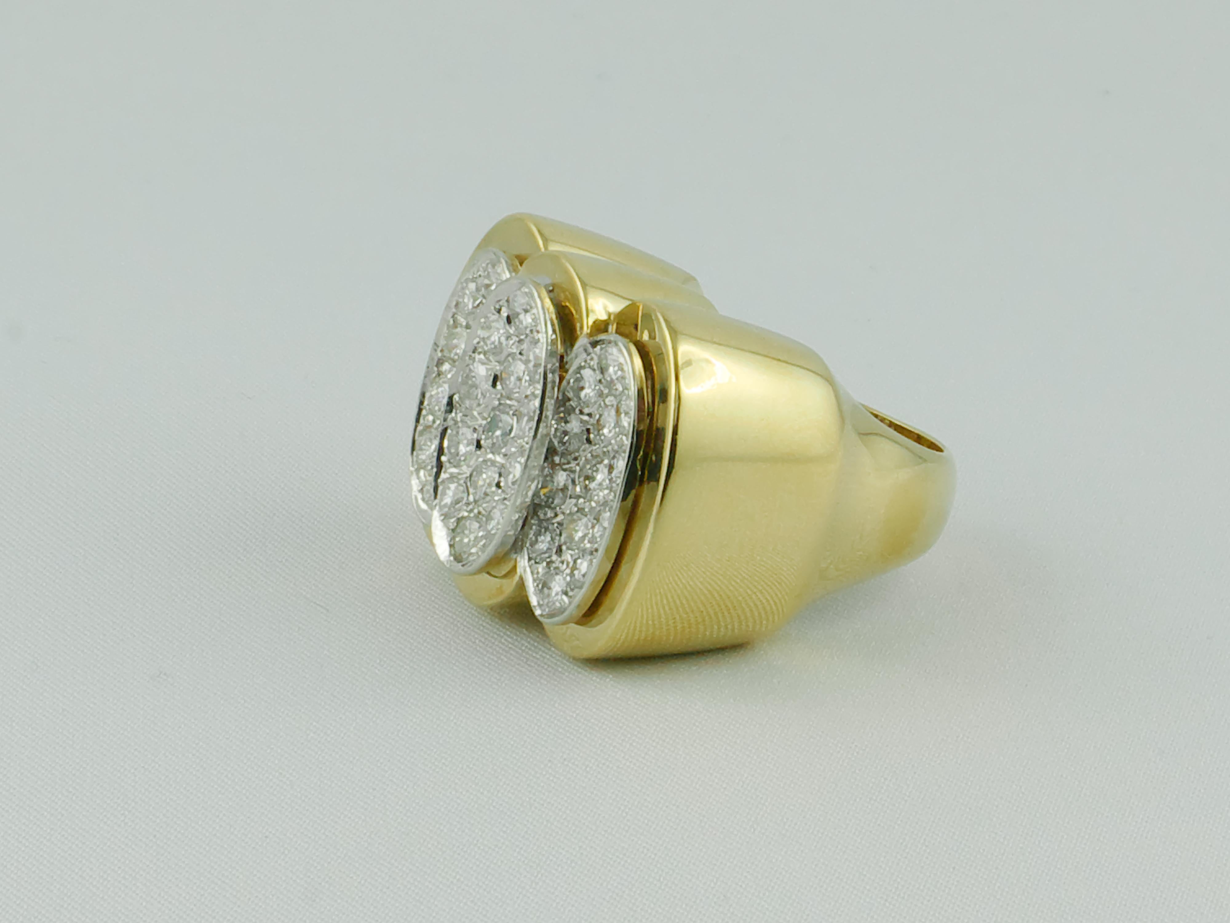 Imposing 1970s 18 karat Yellow Gold Diamond ring pavé set with approx. 2.30 bright white and sparkling round brilliant cut Diamonds 
The unconventional three oval shape pavé is eye-catching and gives the ring  a distintive and glamourous look
Size 6