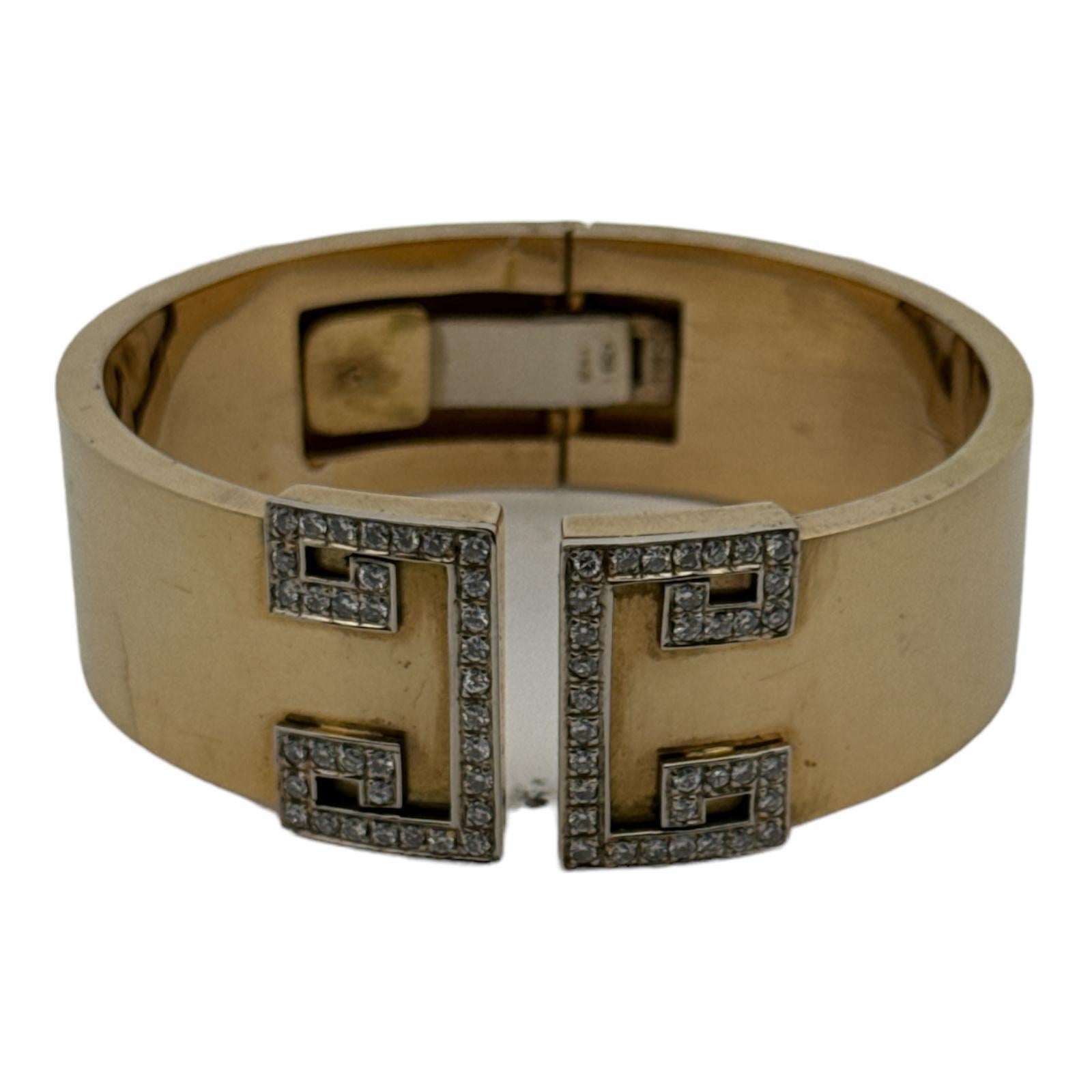 Taille ronde Bracelet manchette à charnières vintage en or jaune 18 carats avec diamants des années 1970 en vente