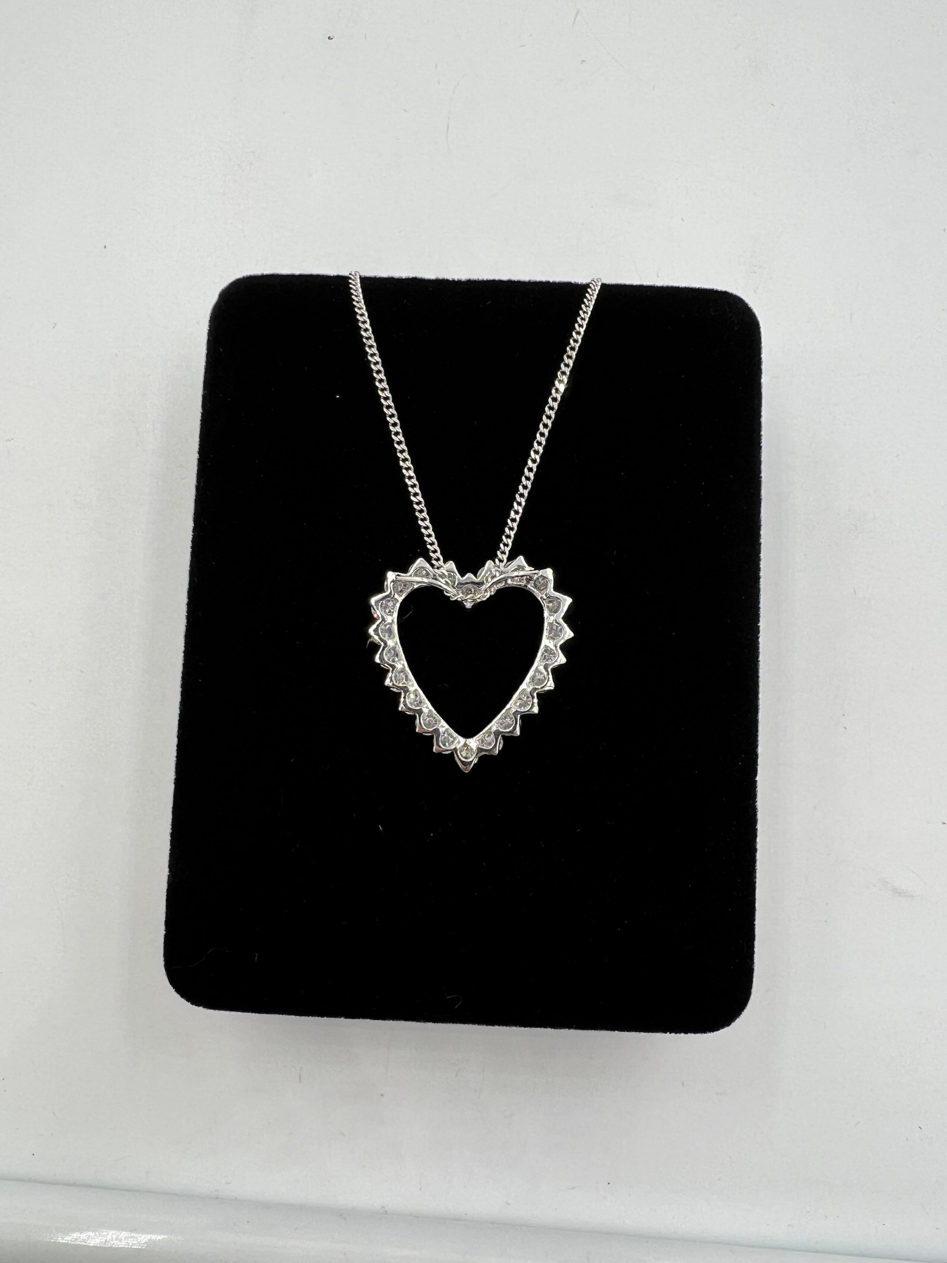 Round Cut 1970s Diamond Open Heart White Gold Pendant Necklace For Sale