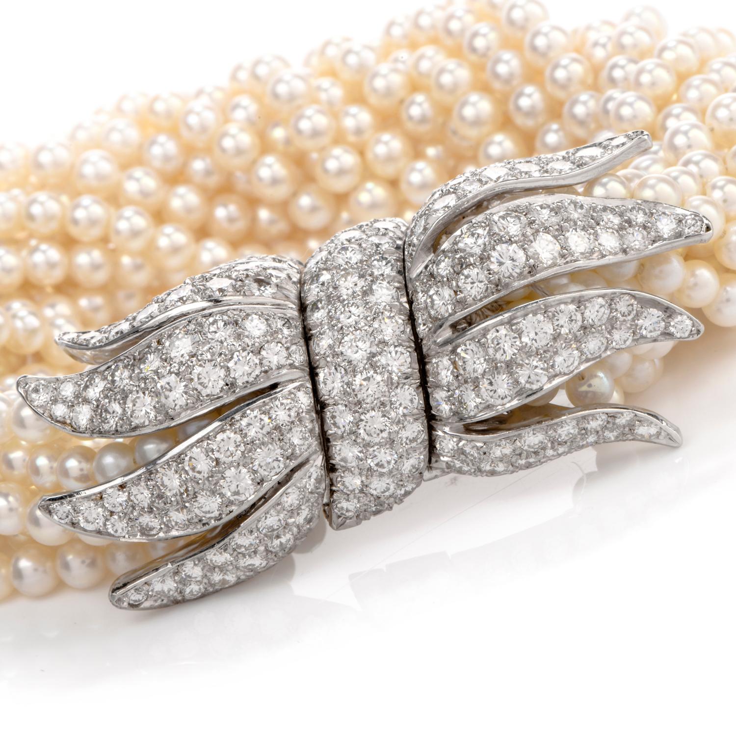 This Vintage Diamond and Multistrand Pearl Bracelet is inspired with an extraordinary Peacock style capping on the ends and crafted in Platinum. This bracelet is sure to Light the room as it's worn yet offers a subtle accent to complete any