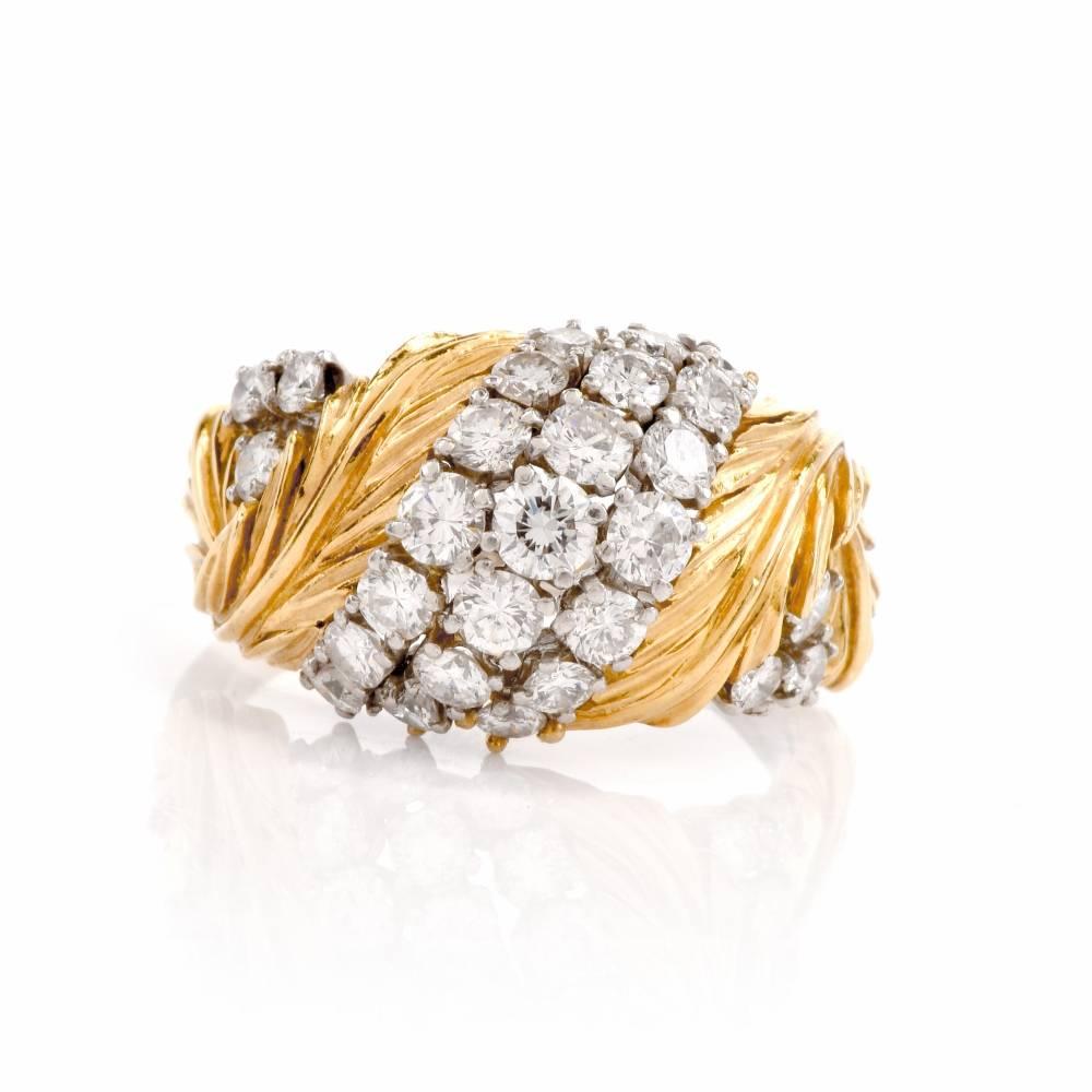 This High quality vintage cocktail dome ring of enchantig botanically inspired aesthetic is crafted in a combination of platinum and 18karat yellow gold, weighing 11.6 grams and measuring 15 mm wide. Designed as a subtly bombe plaque, this