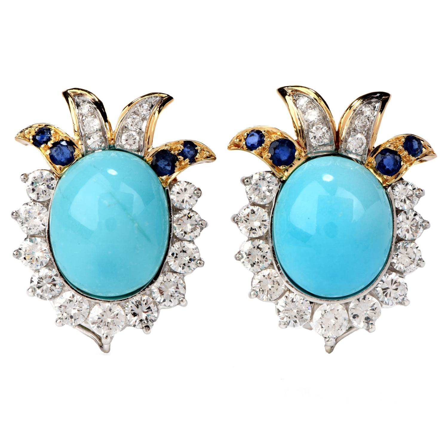 Be the belle of the ball with this extraordinary Estate Diamond Turquoise And Sapphire 18K Gold Day & Night Earrings. 
These earrings are crafted in 18 karat white and yellow gold.  There are 4 genuine turquoise, two in oval cabochon and two in pear