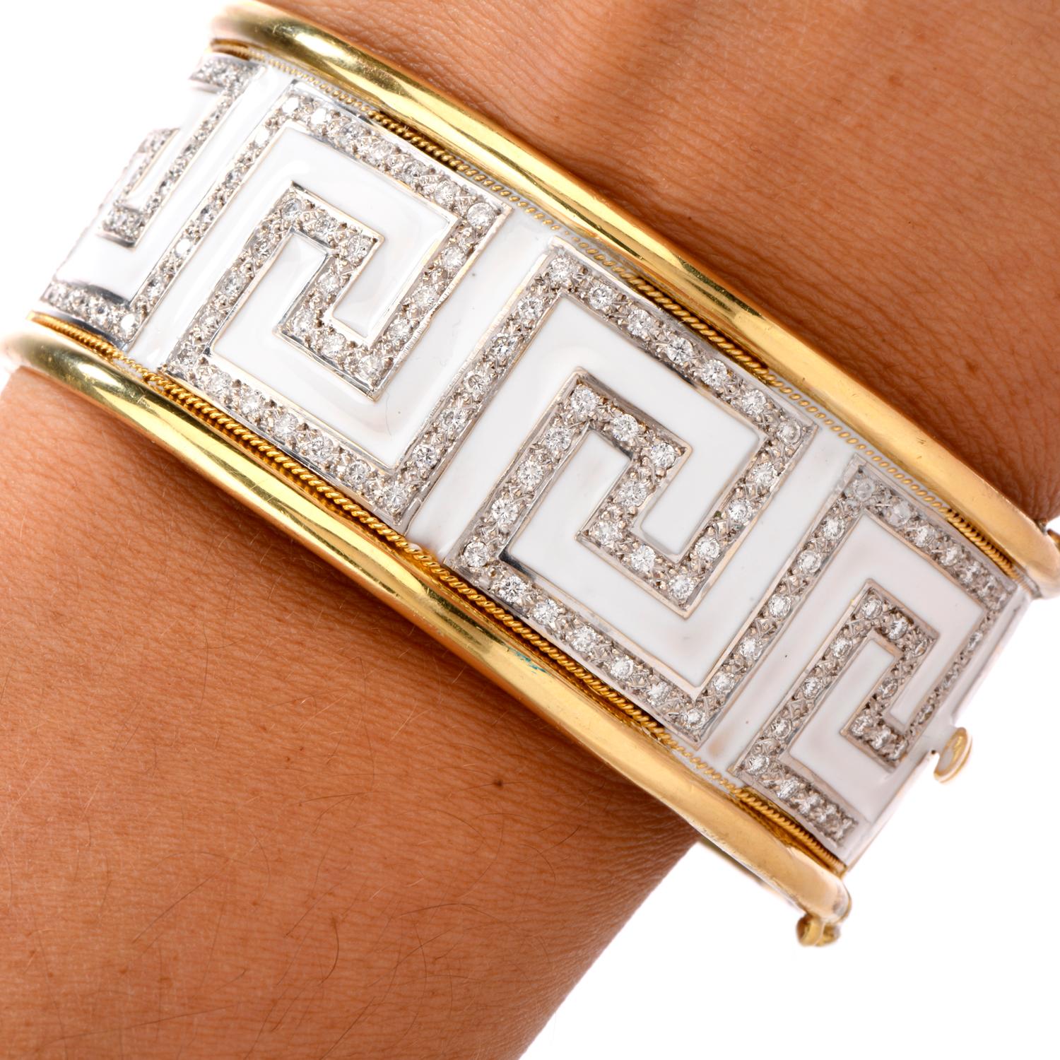 This stunning estate Diamond wide diamond Bangle Bracelet was inpried with a 

Greek Key pattern and crafted in 18K gold.

Bright white enamel surround the Greek Key pattern of approximately

105 round brilliant cut diamonds weighing approx. 2.70