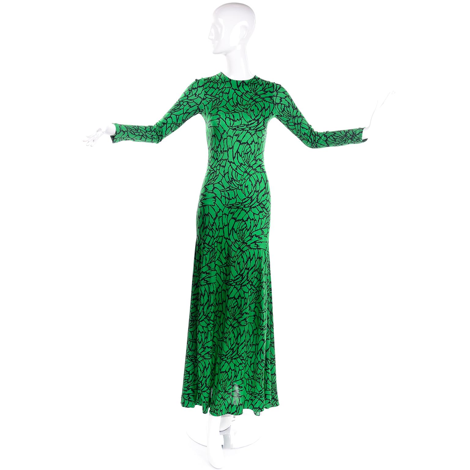 This is a lovely vintage DVF dress from the 1970's in a rich grass green and black abstract botanical print.  The dress was designed by Diane Von Furstenberg during the period that made her famous for her jersey dresses.  This one has an incredible