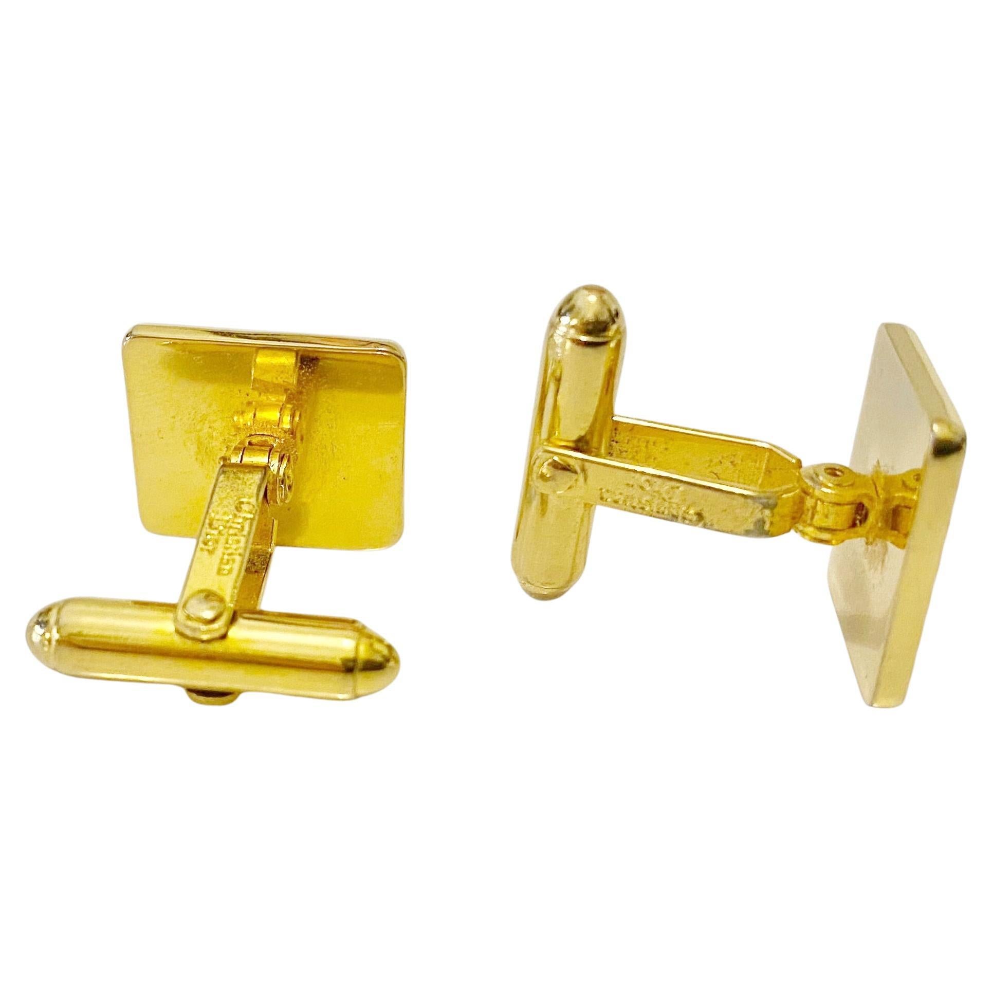 1970 Boutons de manchette Dior en métal doré avec plaque de logo en métal argenté Bon état - En vente à London, GB