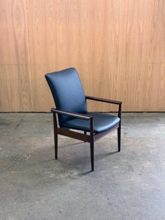 1970s Diplomat Chair by Finn Juhl for Cado in wood and black leather