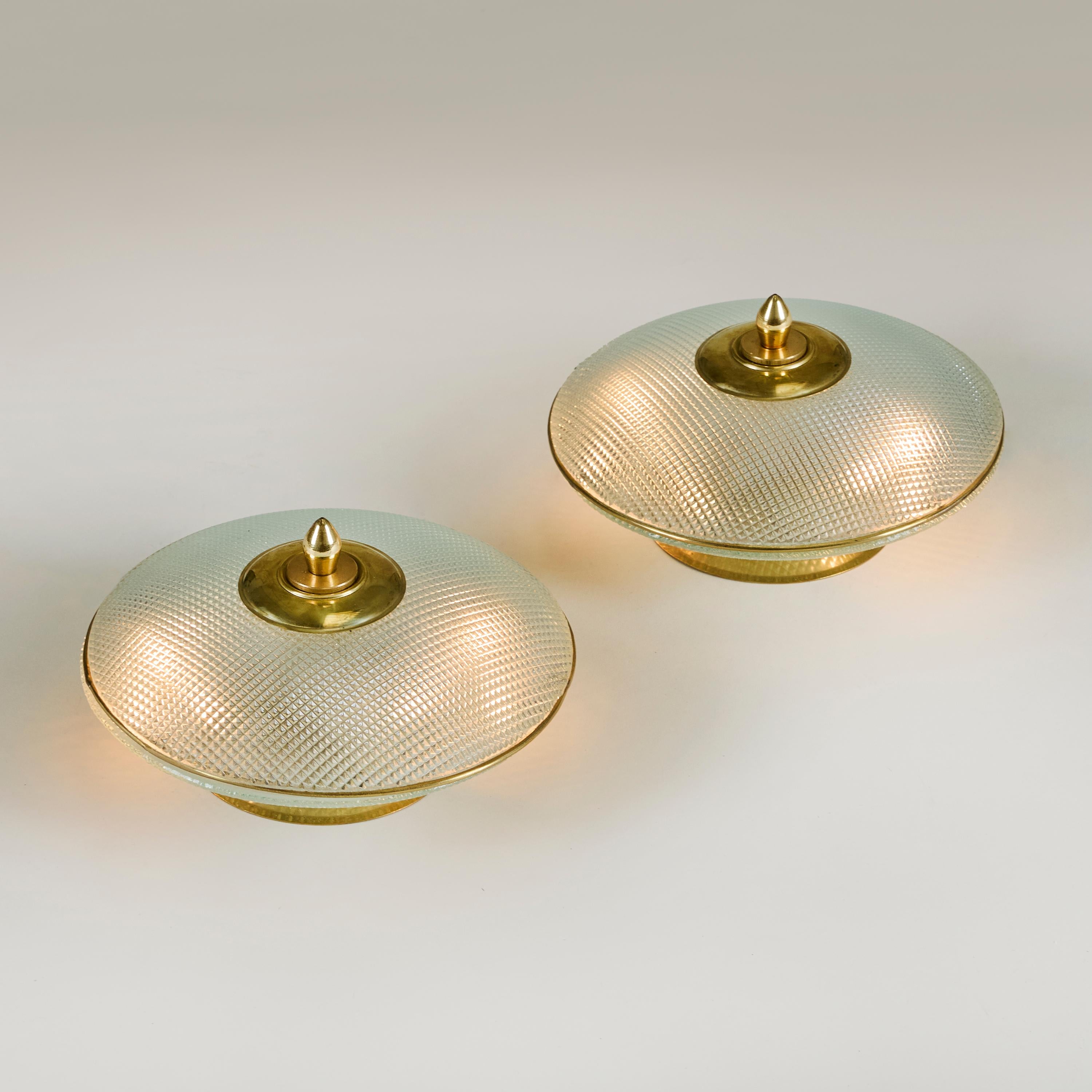 Brass 1970s domed glass table lamps with brass base, frame and decorative filial For Sale
