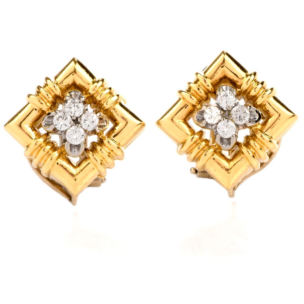 These chic late70’s diamond and gold earrings are crafted in solid 18-karat yellow gold, weighing 39 grams and measuring 2.25” long x 29mm wide (max). Featuring 16 round cut, prong set diamonds, at the lobe and the drop, collectively weighing
