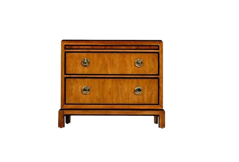 Breathtaking pair of campaign style burl wood and brass accented Drexel Heritage Chinoiserie nightstands. Offered by Drexel from their “Avenues” line of interior furnishings. This seldom seen line is the first for us at Furnish Me Vintage and