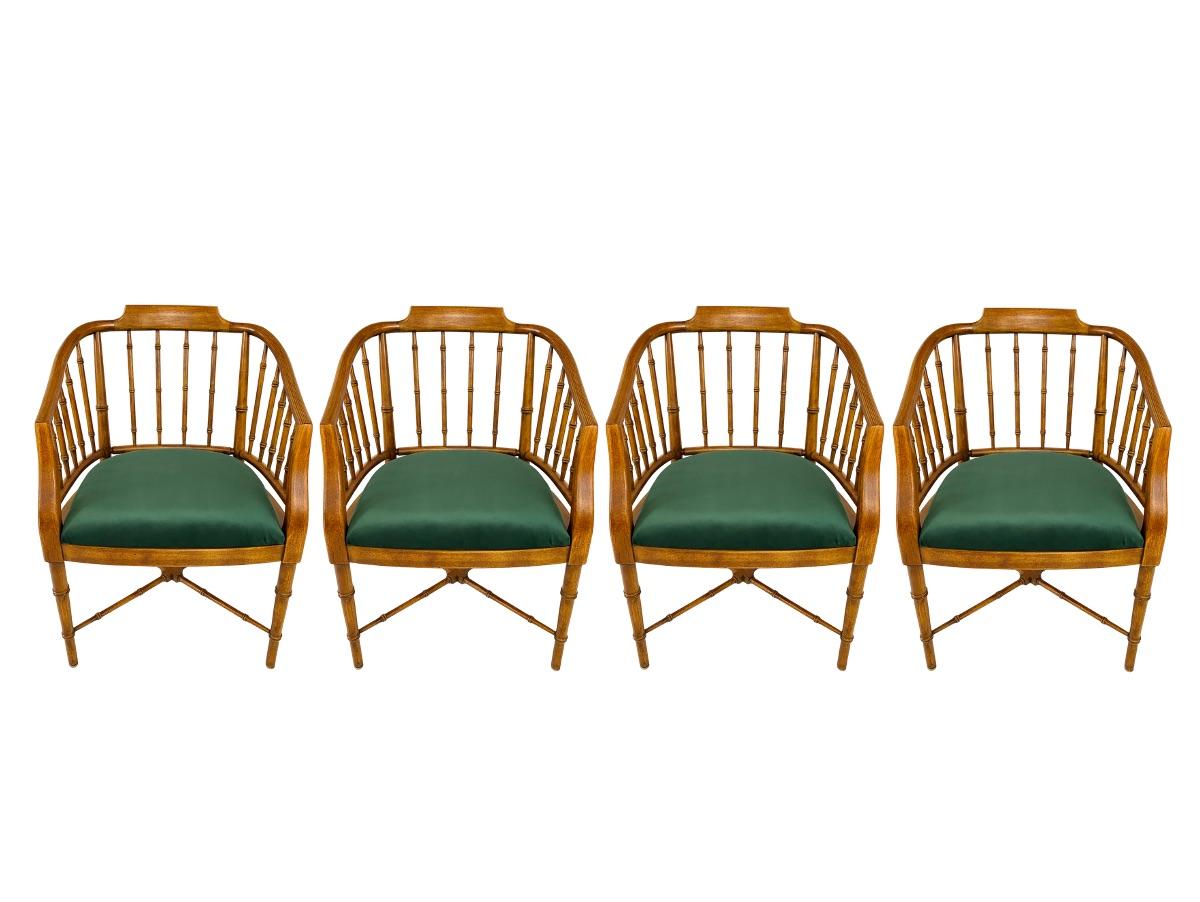 A set of four vintage 1970's Hollywood Regency faux bamboo armchairs by Drexel Heritage. Solid fruitwood frame with turned faux bamboo detailing, a curved barrel back, tapered legs and an x-stretcher. All new seat upholstery featuring a dark emerald