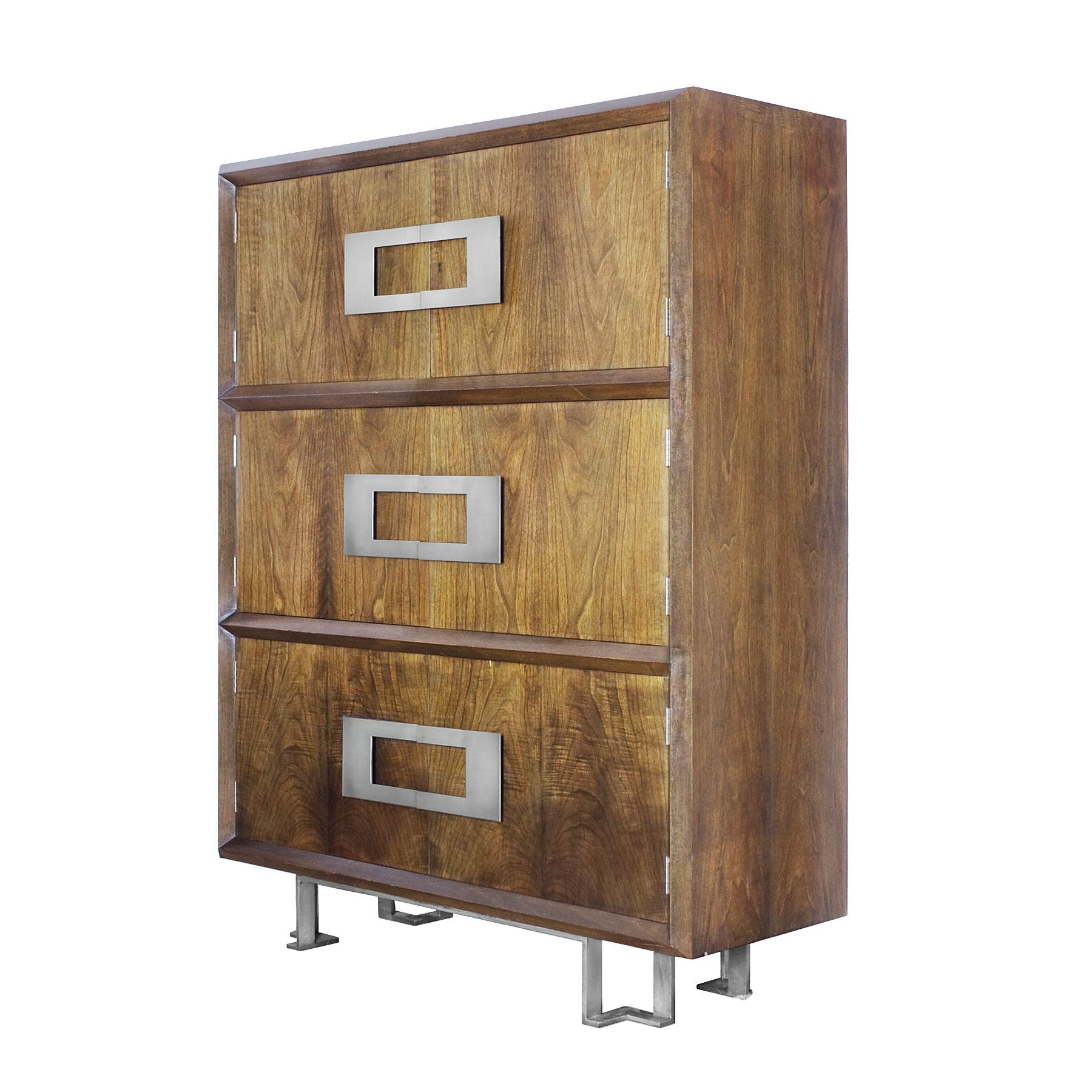 Important dry bar with six doors, stained and French polished walnut veneer. Red lacquer inside with small sliding tray and four drawers. Nickel plated solid brass handles and feet.
Design: Jordi Vilanova

Spain, Barcelona, circa 1970.
