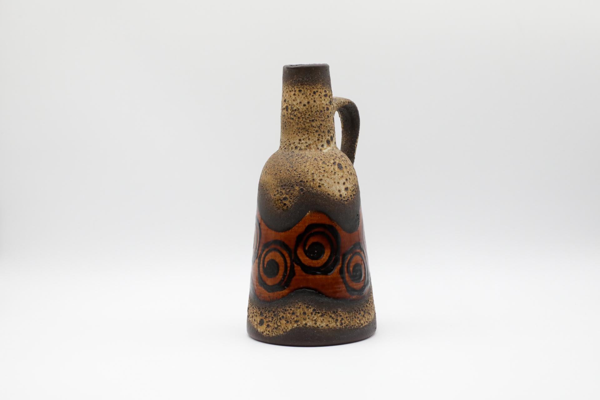 Beautiful West German water jug with spout. Marked '1058/30' on bottom. Regarded as the golden age of ceramics, highly collectable 1950s-1970s Art Pottery is known for experimental and exploratory glazes, shapes, colors, and forms. With over 100