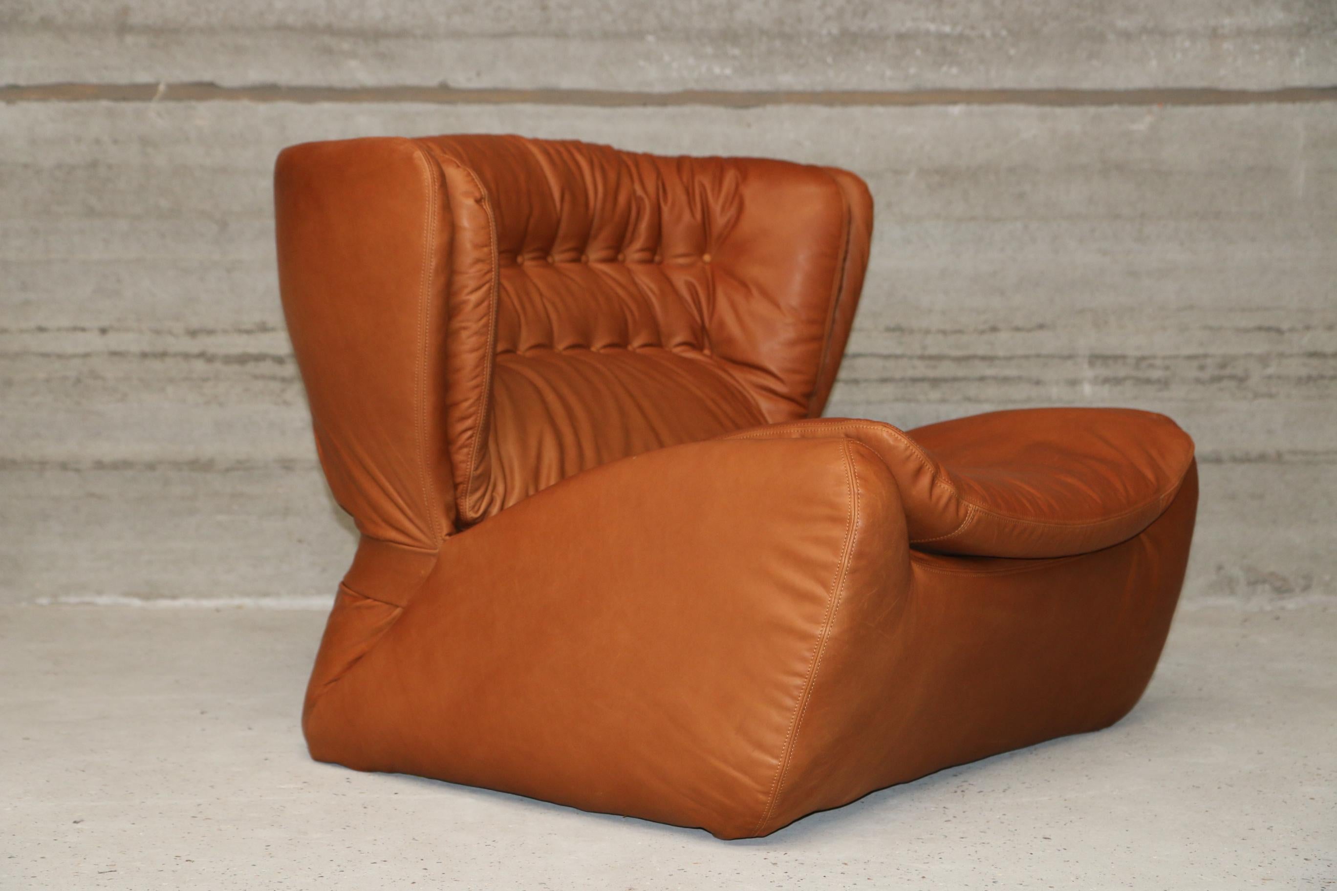 Stunning piece from the 1970s re-upholstered in cognac leather by Funky Vintage Belgium.
Our signature leather is from European bulls, full grain, biologically colored
very rare model, top Belgian design and quality.
Armchair = W 90 D 100 H 85 SH