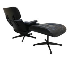1970s Eames 670 Lounge Chair and 671 Ottoman Black Leather Herman Miller by ICF