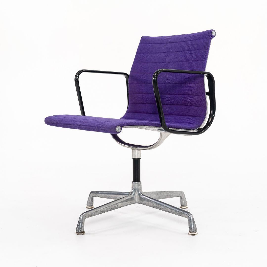 This is an Eames Aluminum Group Management Desk / Side Chair, model EA-108, designed by Charles and Ray Eames for Herman Miller in 1958. This particular example was produced in the 1970s. The design sports a solid yet lightweight die-cast aluminum